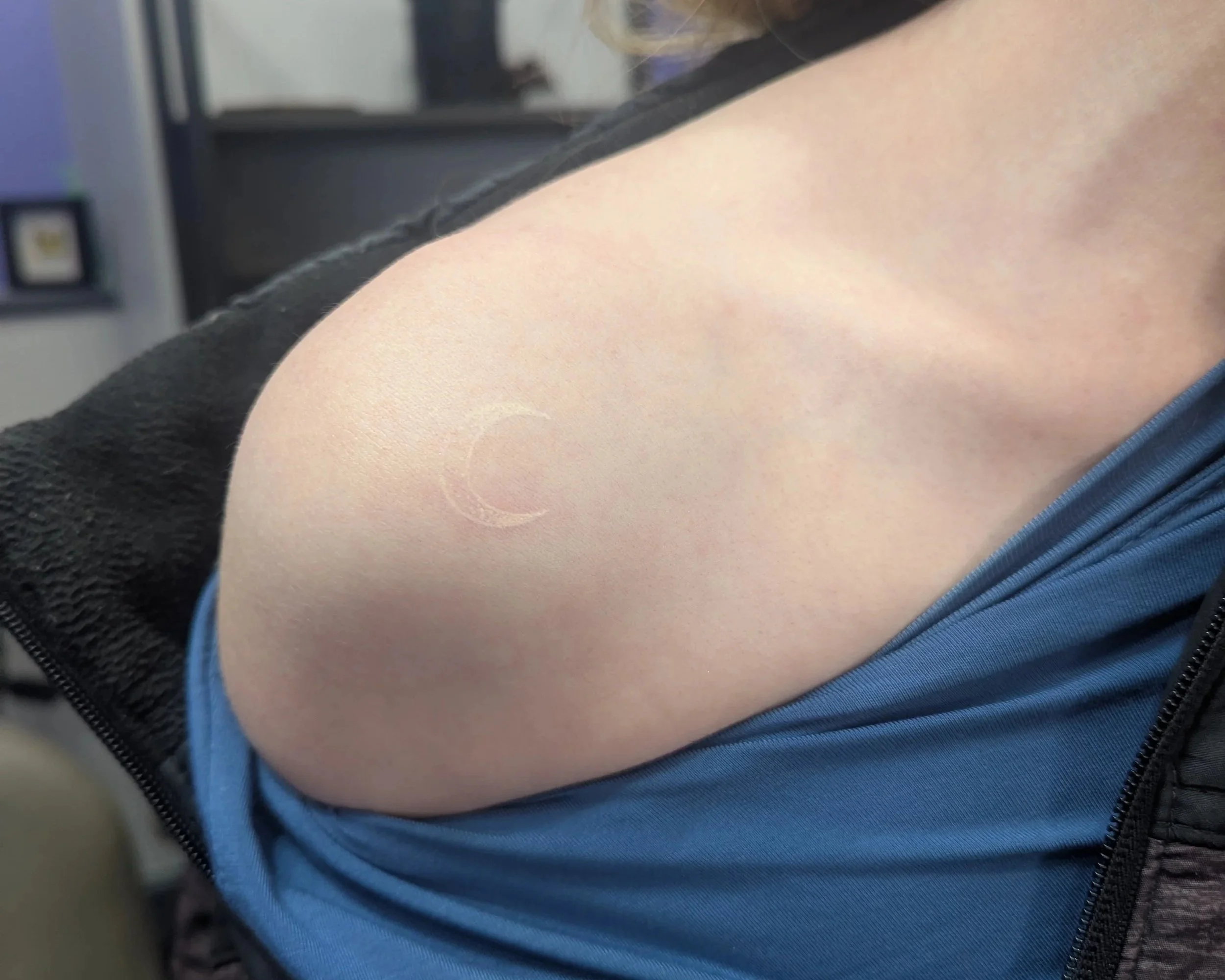 HEALED white ink tattoo done by Savannah