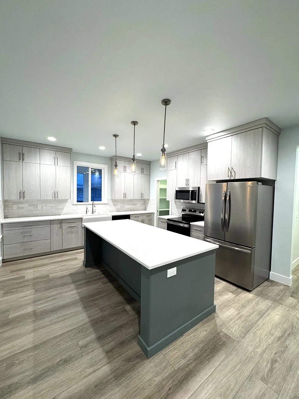 828 Mann Creek Living, Dining, Kitchen (1.1).jpg