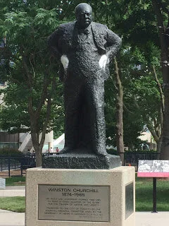 Why does Winston Churchill have bandaged hands?
