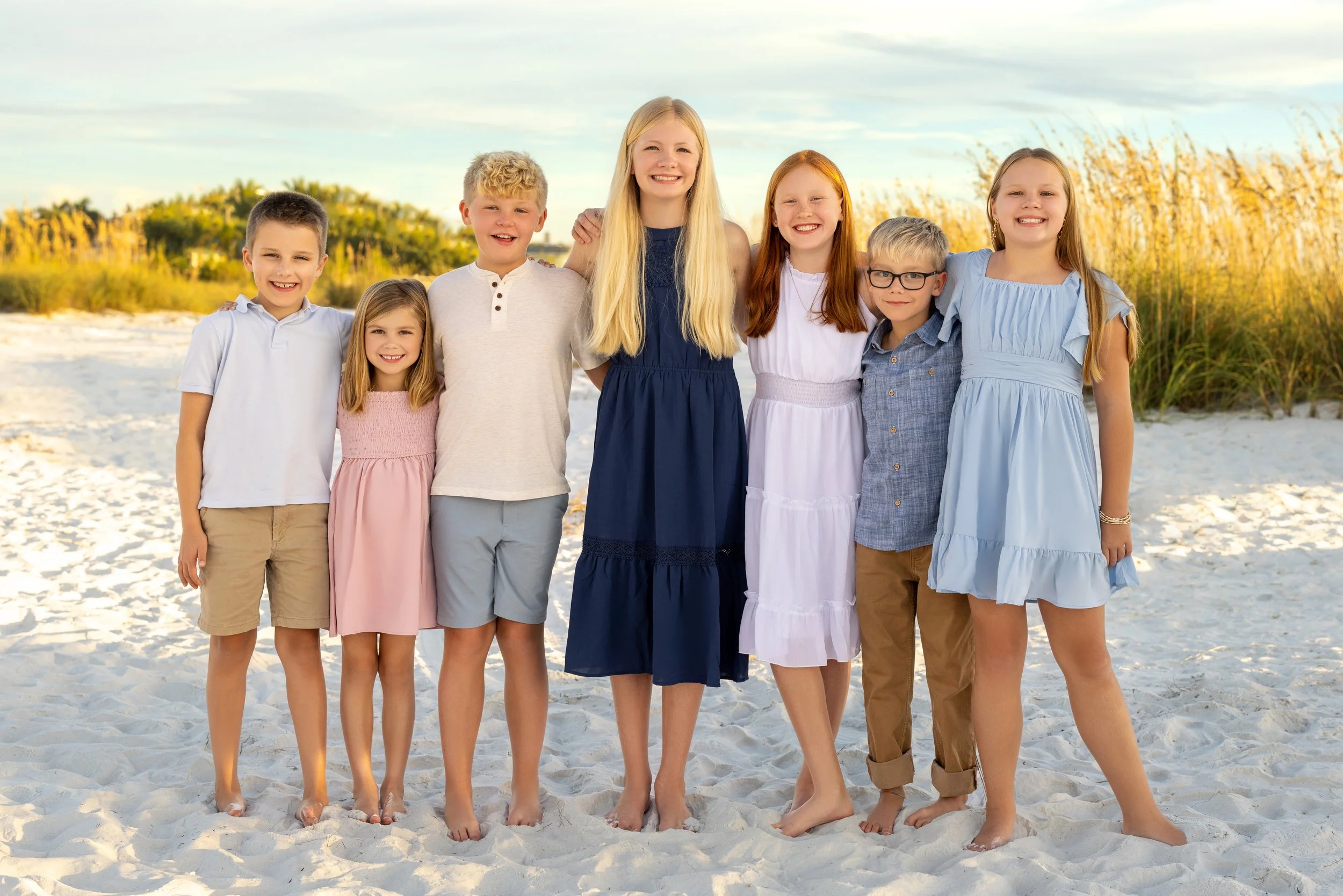 Group of young cousins during family beach photo session