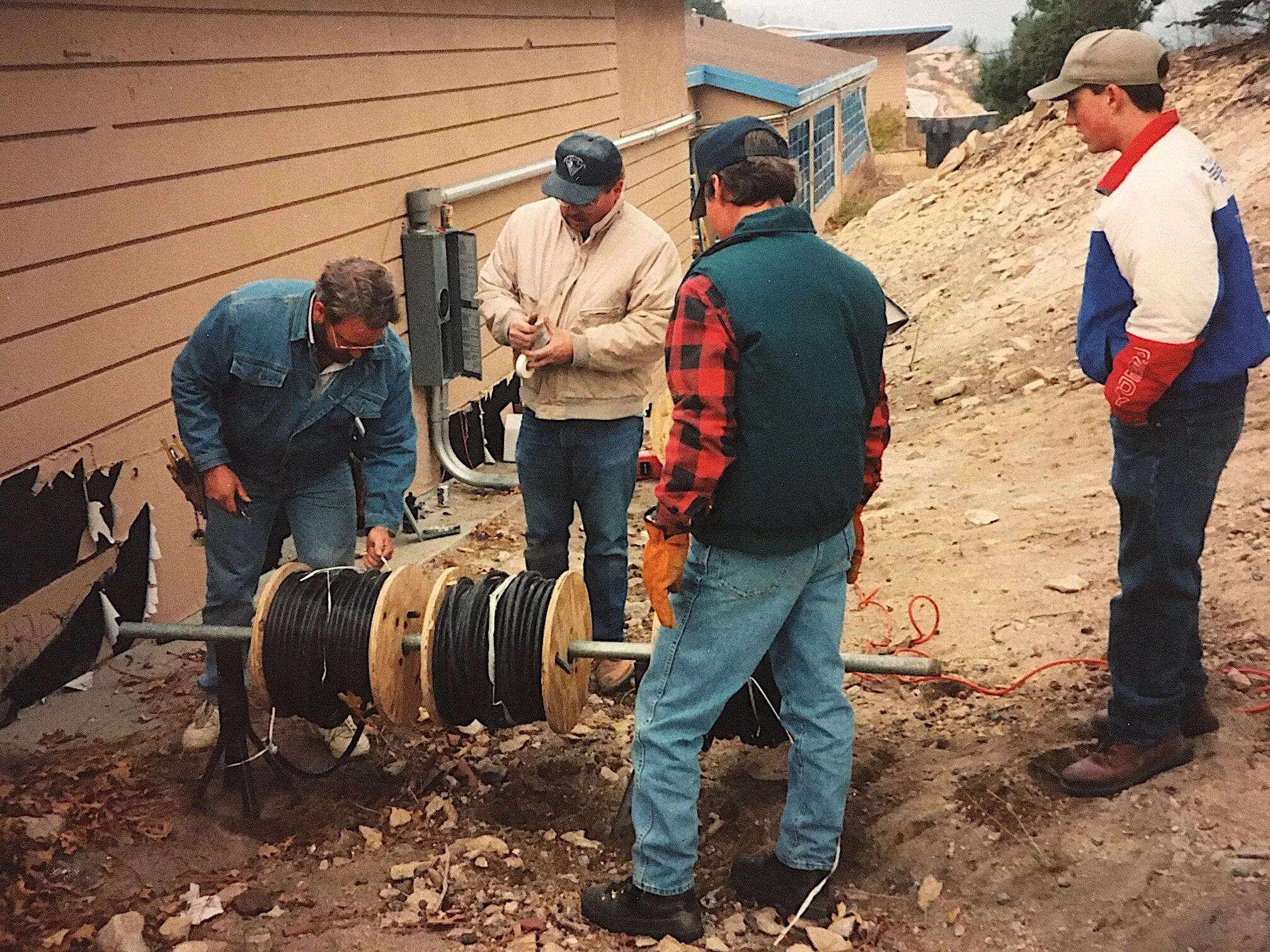   The electrical team of MSAS pulls wire to complete utility hook up.  