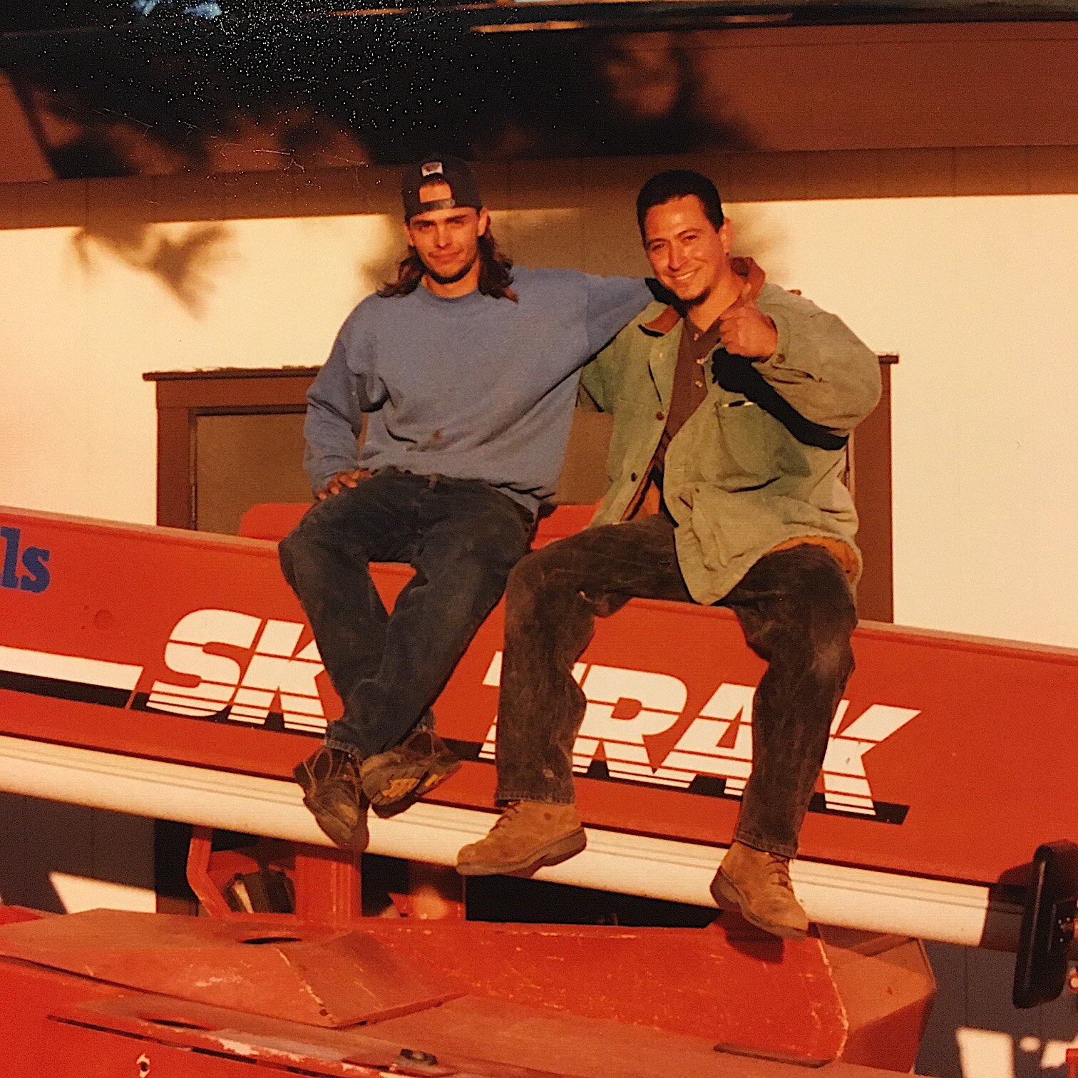  Heavy equipment professionals relax after a job well done. 