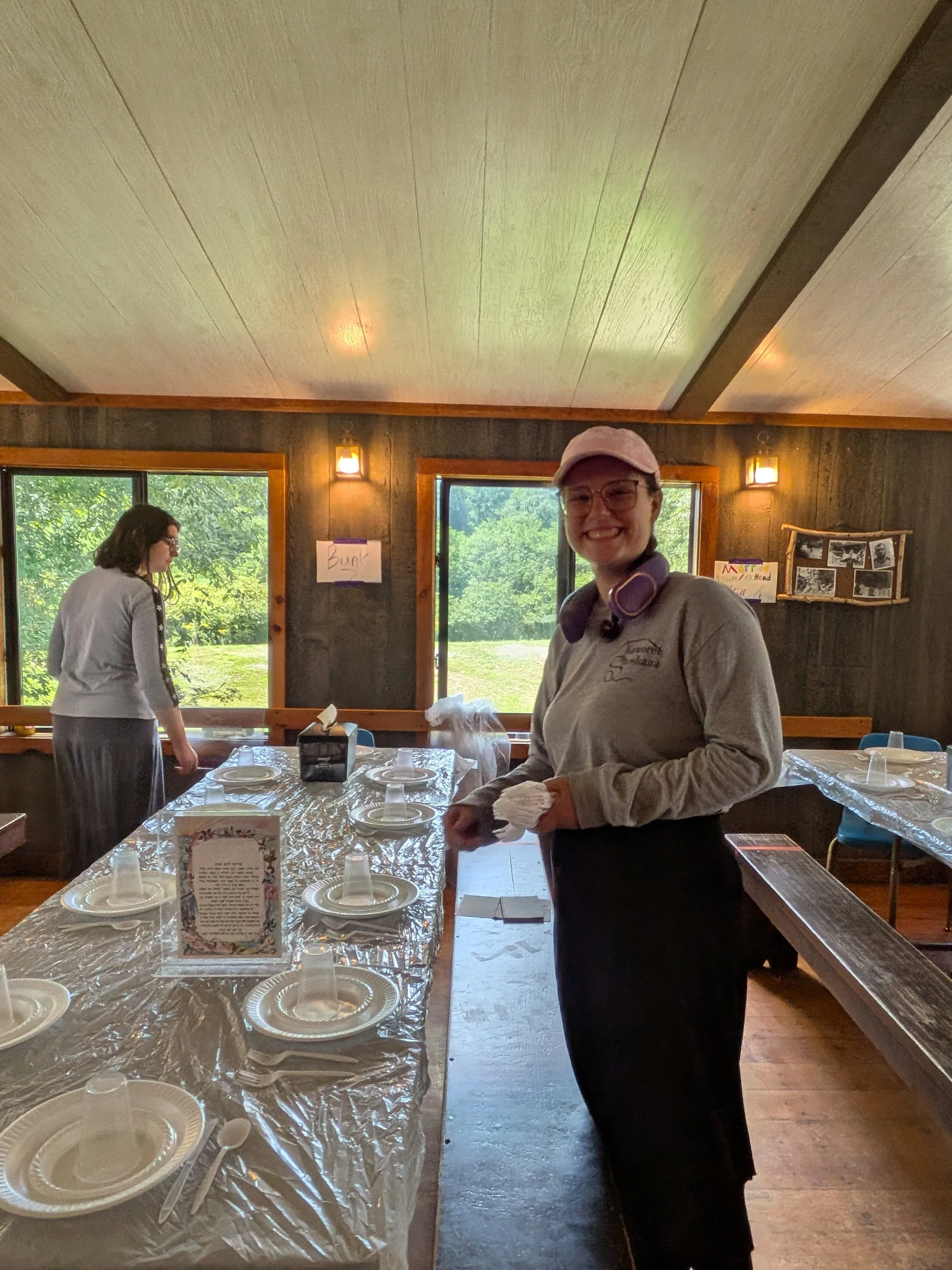 Campers setting tables for Shabbos