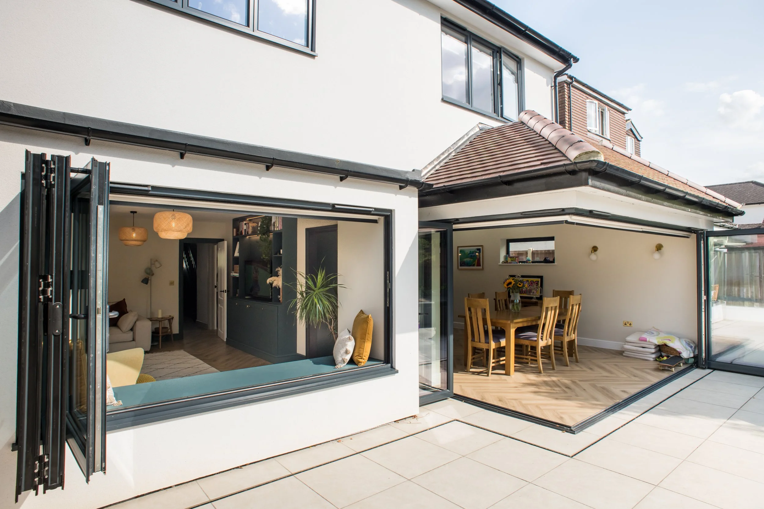 Wraparound extension external view with bi-folding doors and window.JPG