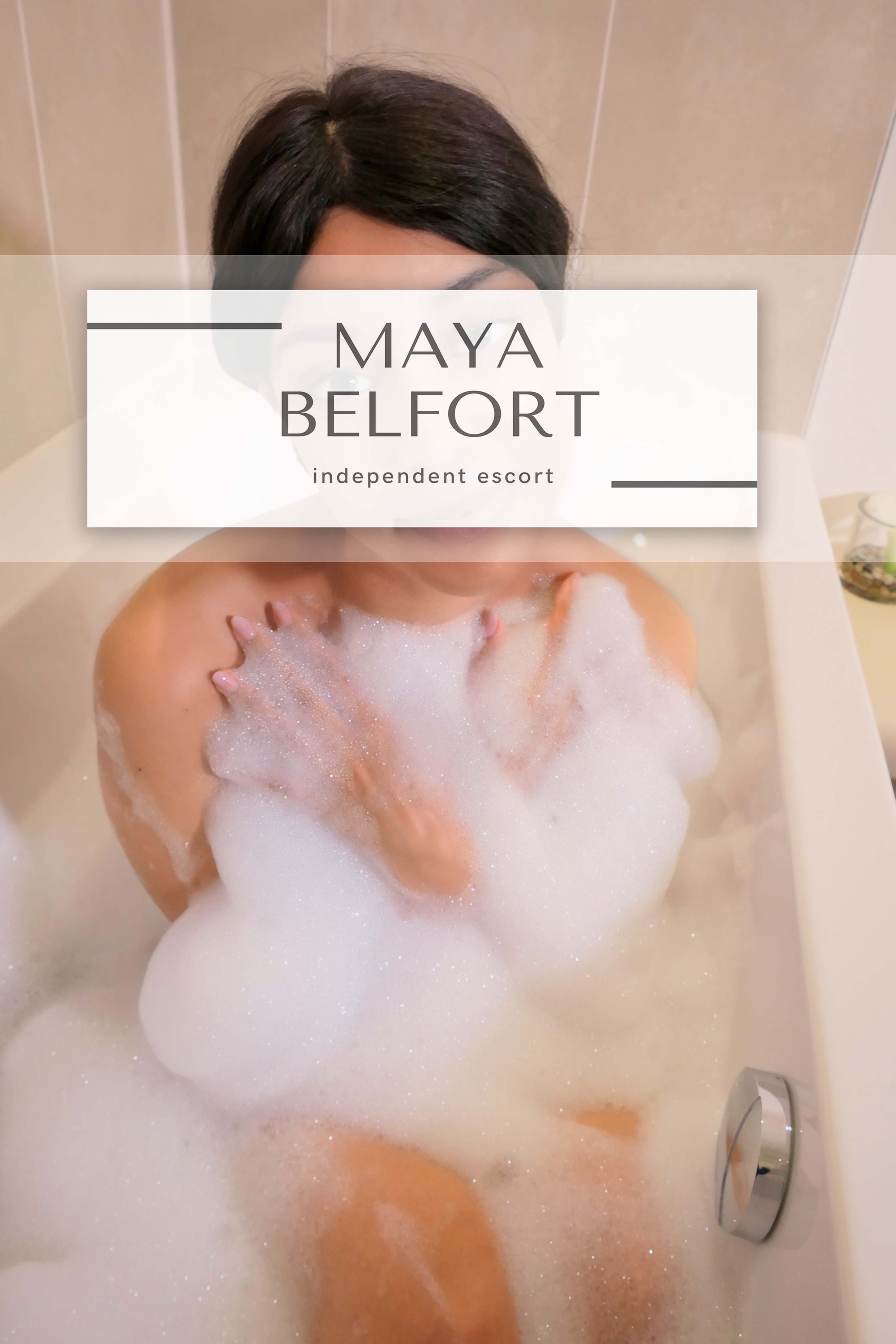 maya is your wellness escort for a tingling time-out with a wellness holiday. On the picture you see her in a bathtub with lots of foam.