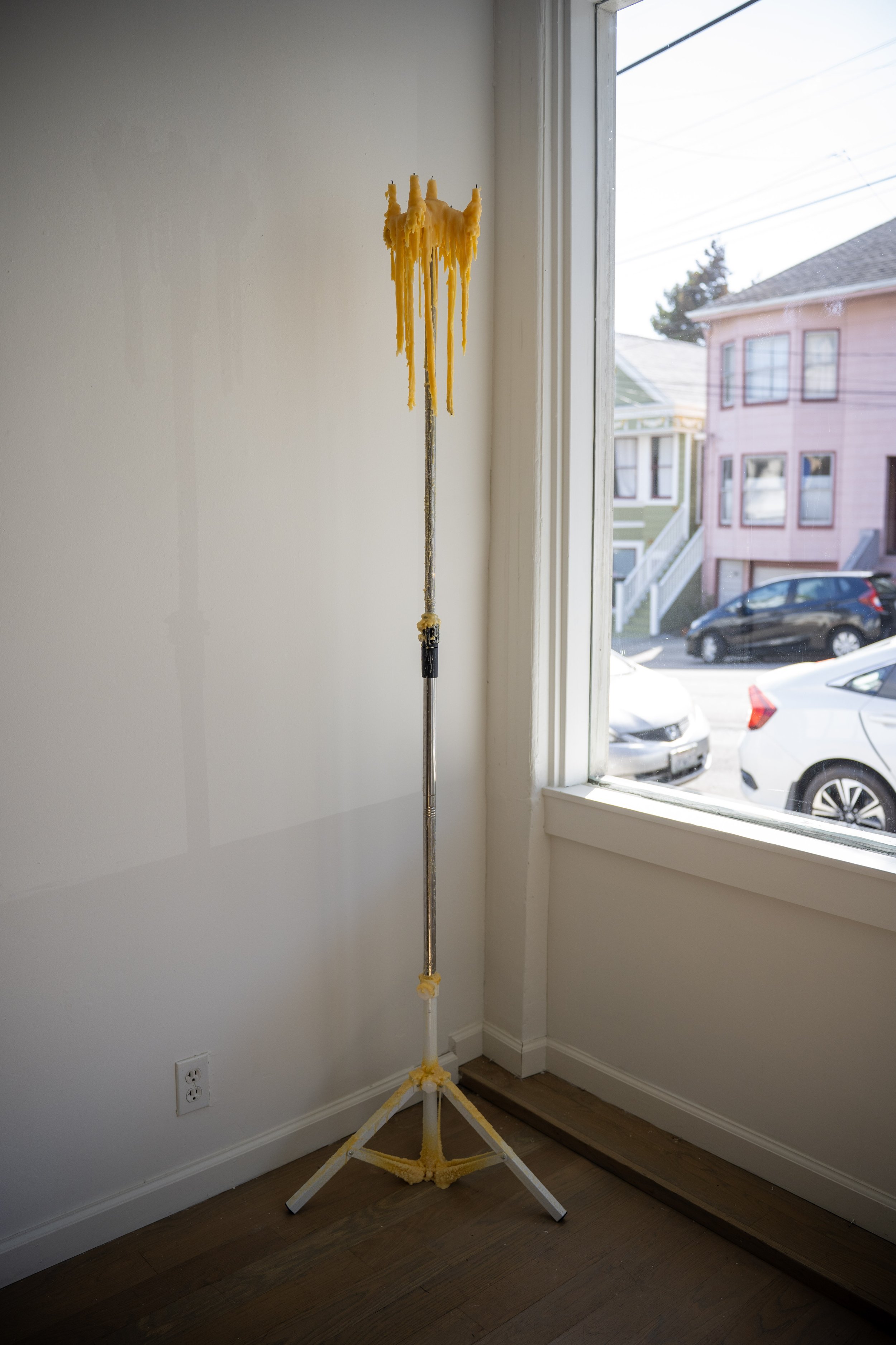ALEX EHMER  IV, 2026  Intravenous stand, beeswax 84 x 12 inches $5,000