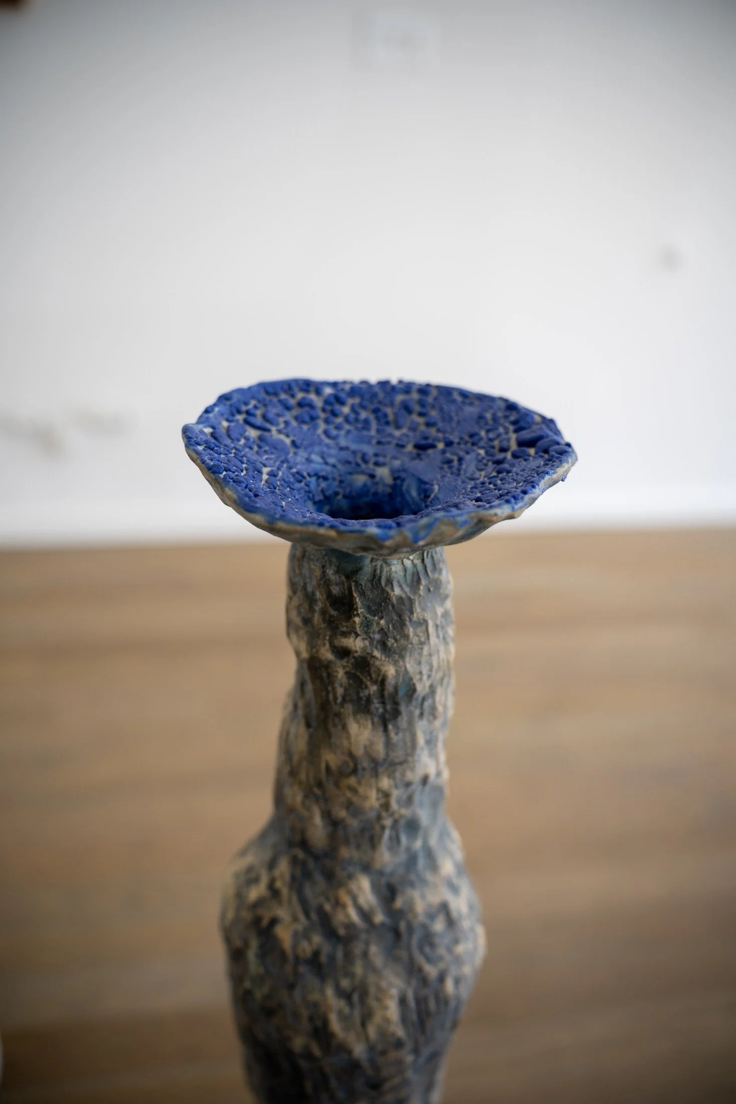 ANNA-ISABELLE BRUEY-SEDANO  Les sœurs — sculpture 5, 2026  Oxide wash, cobalt underglaze, blue crackle glaze 36 x 12 x 13 inches $2,200