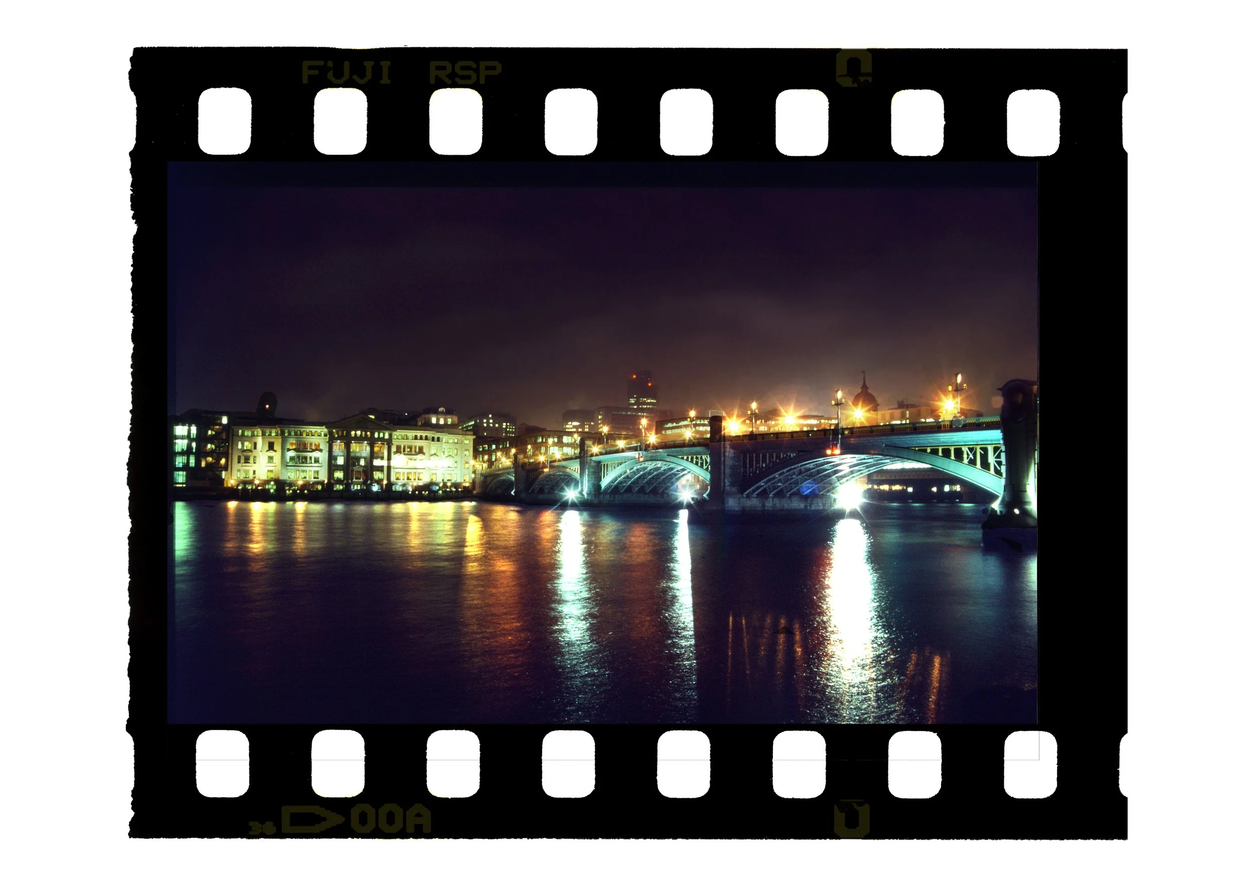 London at night, Looking across the Thames at bridge_Fuji.jpg