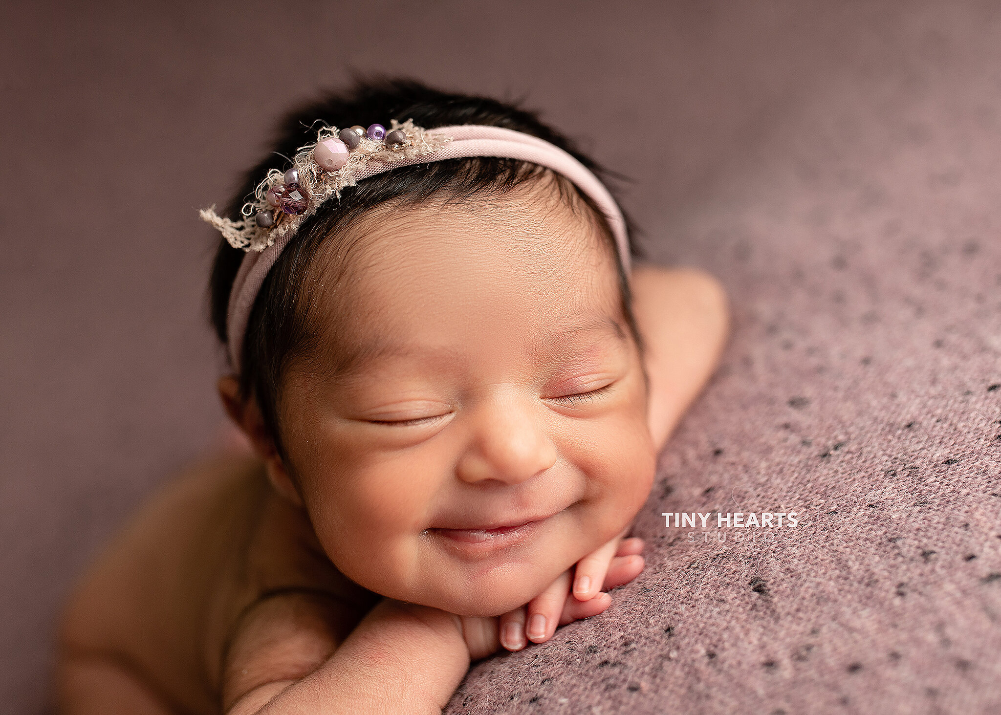 smiling infant girl, St. Cloud MN newborn photographers