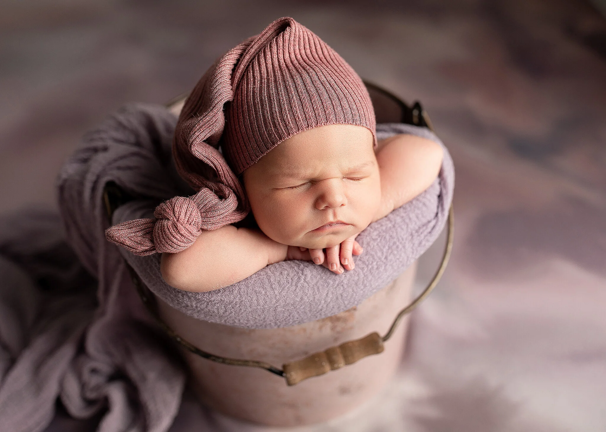 baby girl asleep in bucket, Melrose MN newborn photographer
