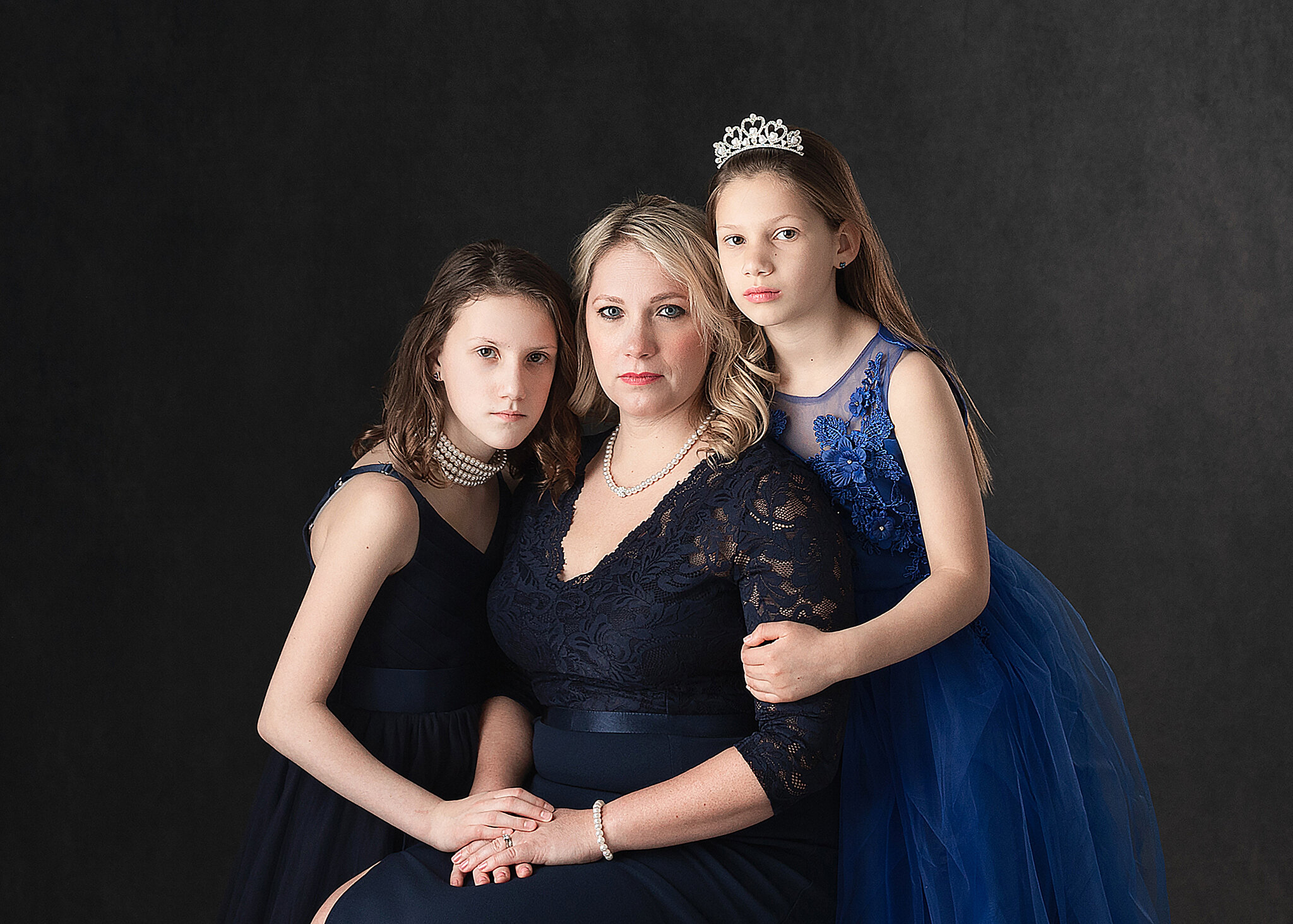 mother and daughters in fancy dress