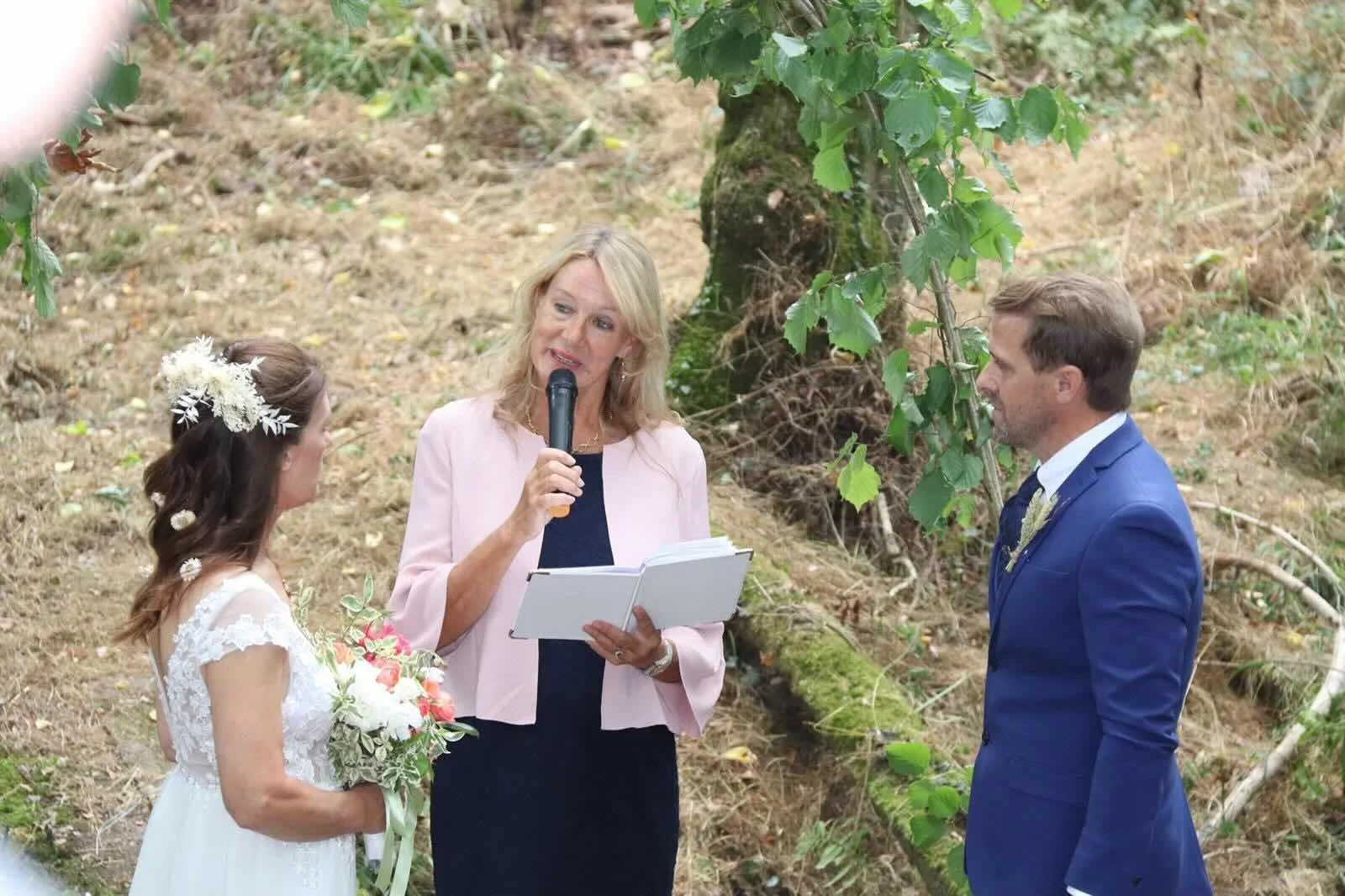 Saying vows at woodland wedding ceremony in Wiltshire led by celebrant Lucy Till