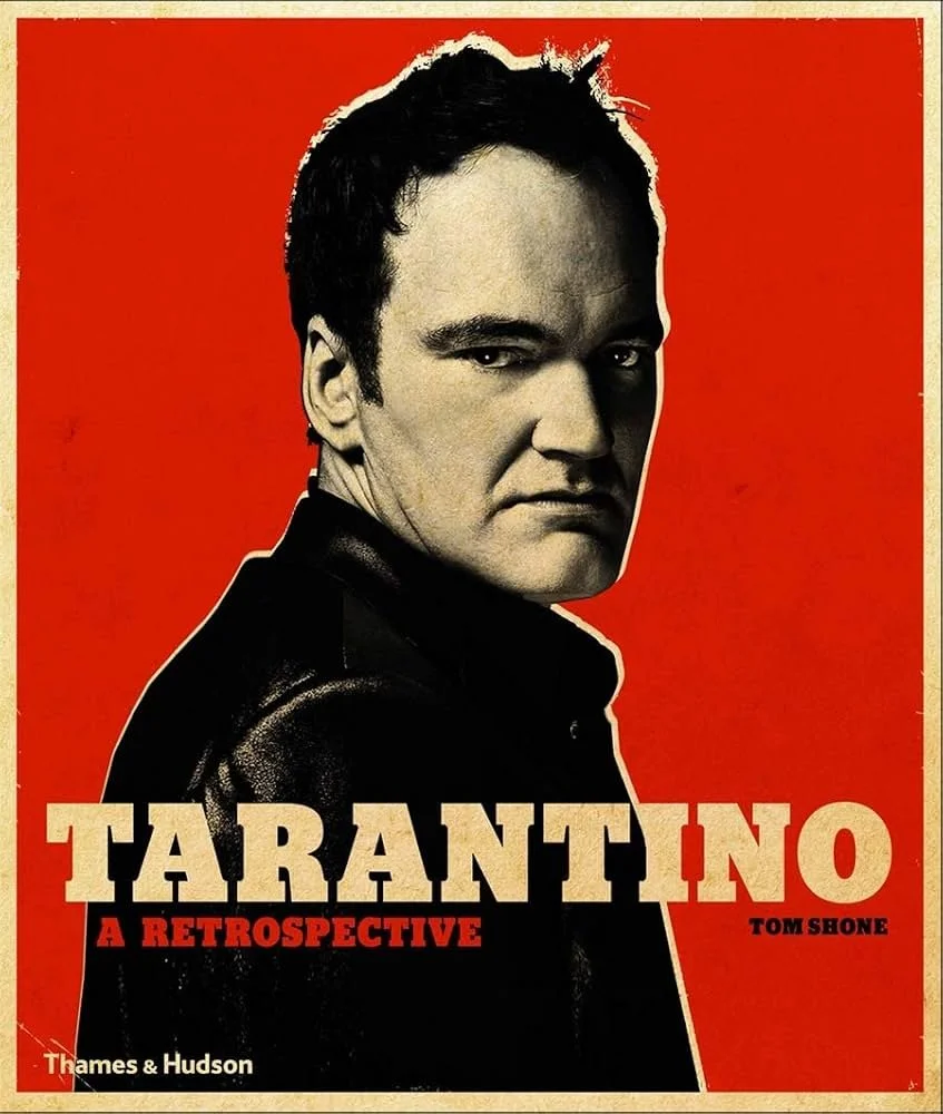 Book cover for 'Tarantino: A Retrospective' featuring a black and white photo of a serious Tarantino with a red background and bold text.