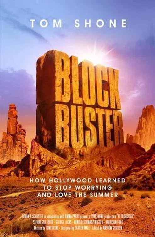 Book cover for 'Blockbuster' by Tom Shone, featuring large rock formations in a desert landscape at sunset.