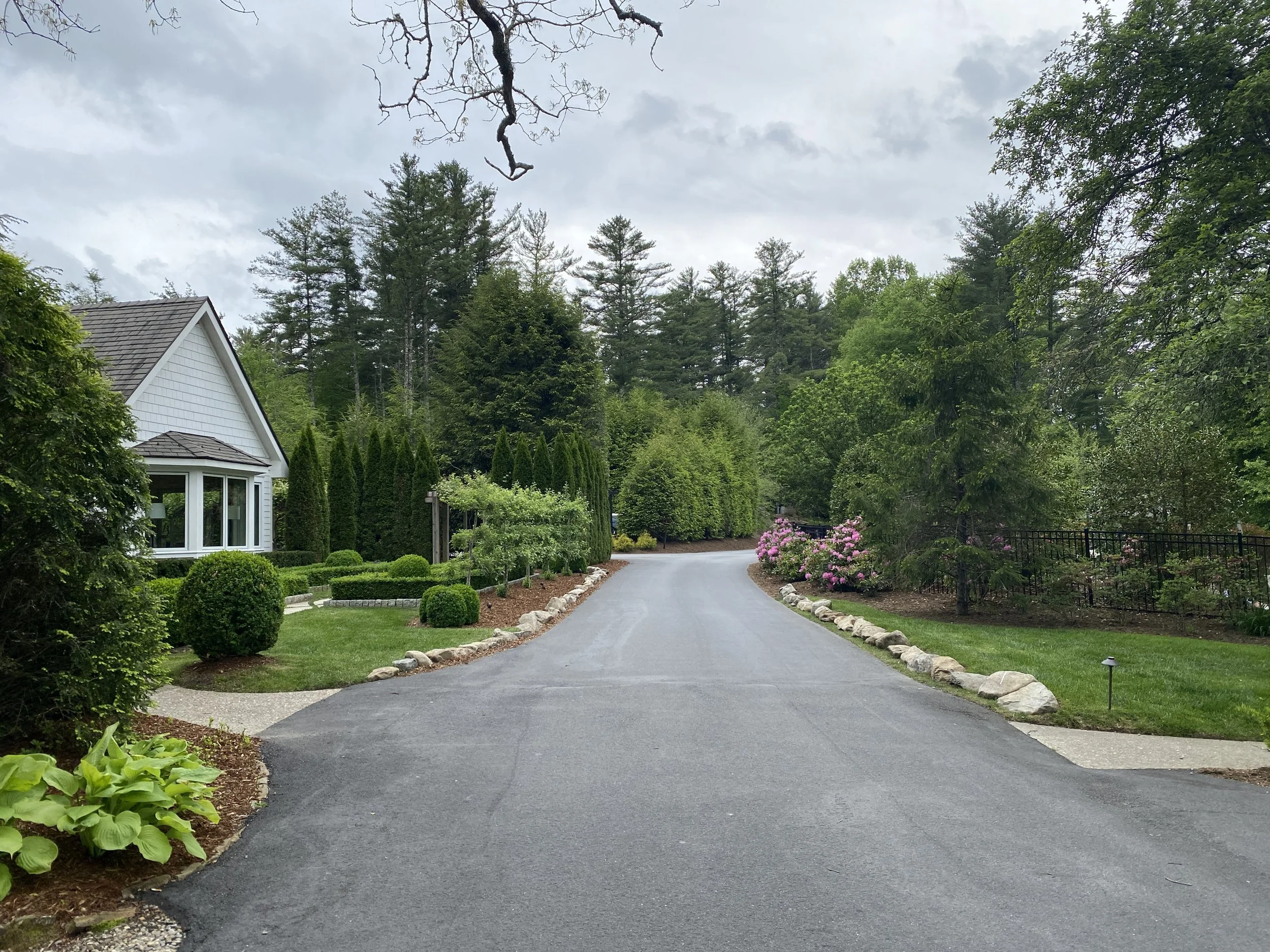 Tree-lined drive and landscaped grounds at Half-Mile Farm in Highlands, North Carolina