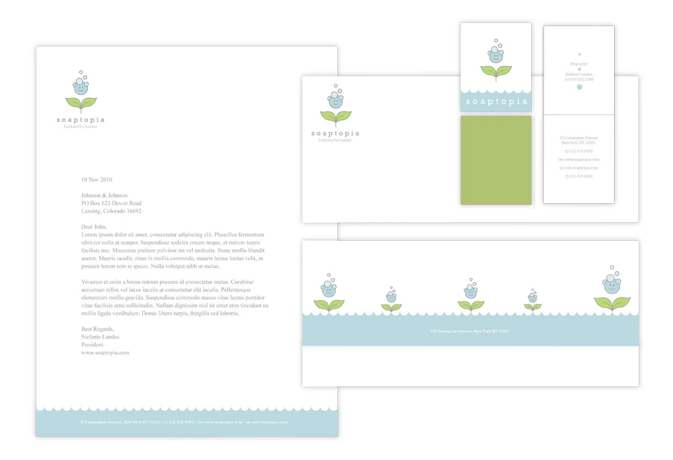 Staging view of stationary for soaptopia. It contains a letterhead, envelope, and business card.