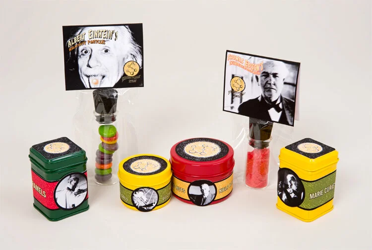 Group shot of the candy packaging - each one with a famous scientist on it.