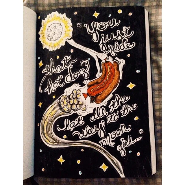 Photo of illustration of a flying hotdog that says "you just ride that hotdog hat all the way to the moon, girl".