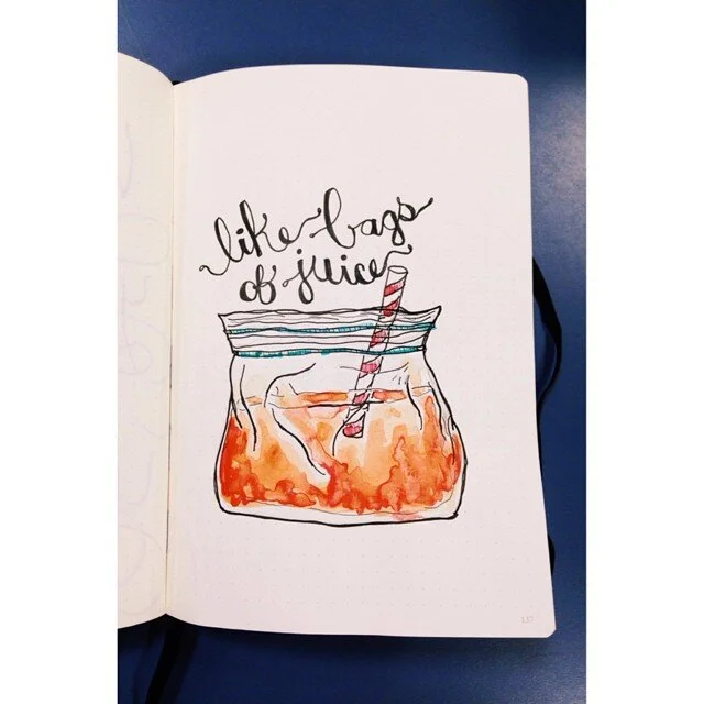 Photo of a illustration from "Project 365": It has juice in a plastic baggie with a straw and says "like bags of juice".