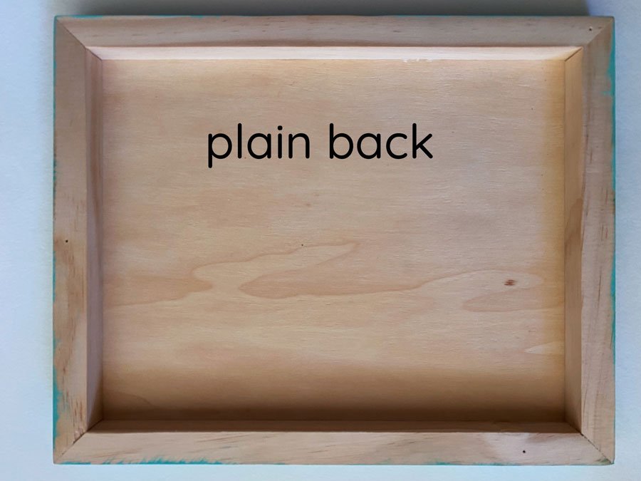 Photo of the back of the wooden panel with no hanging mechanisms - option with a plain back.