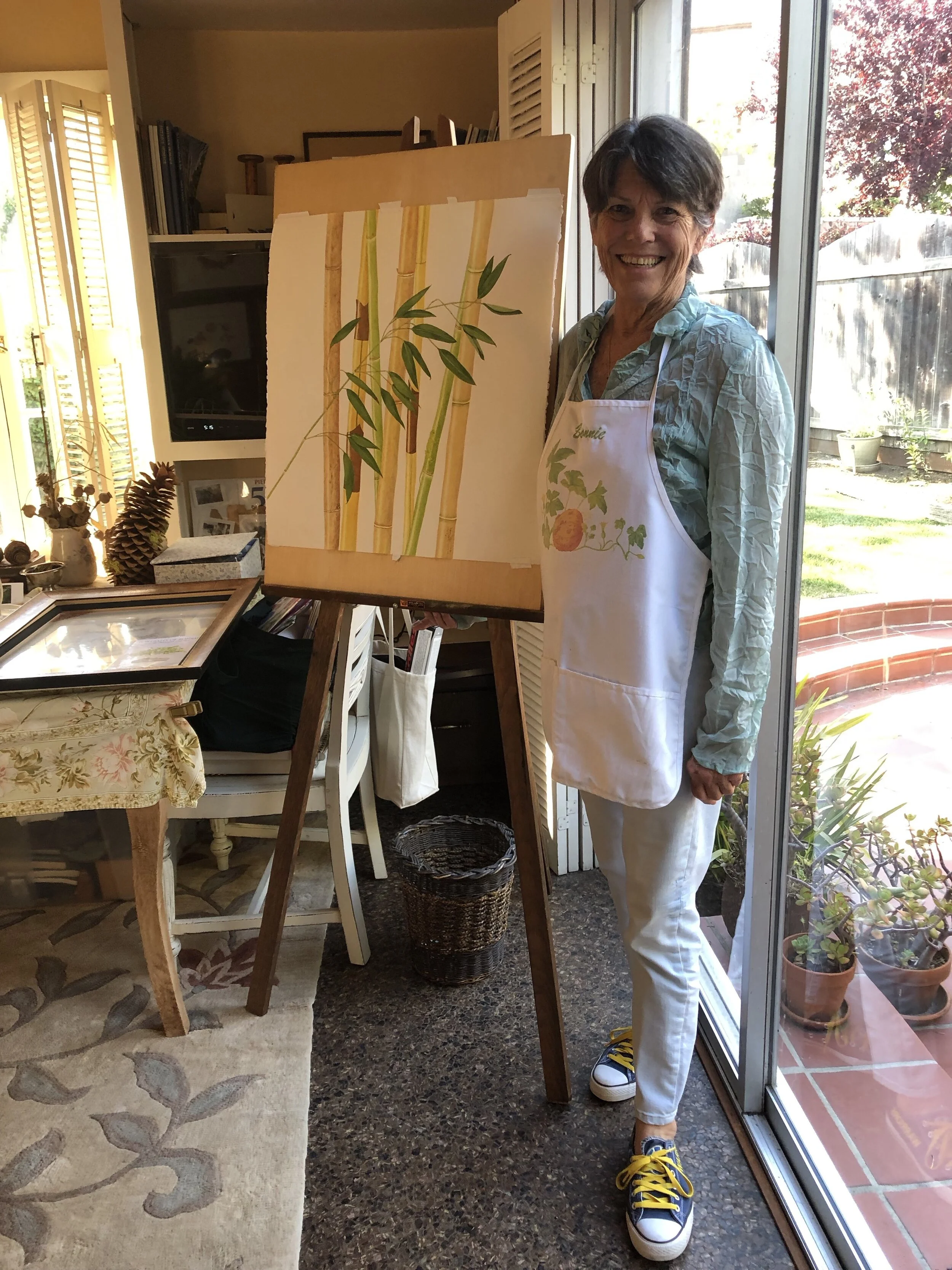 Bonnie Bonner in her studio. Note her Warriors fan sneakers!
