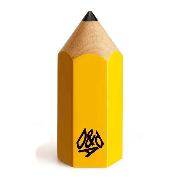 Yellow D&AD award pencil trophy on white background.