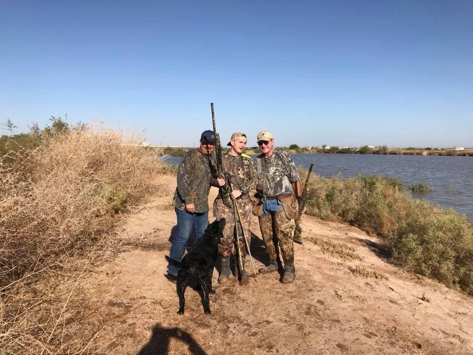 hunters next to the pond.jpg