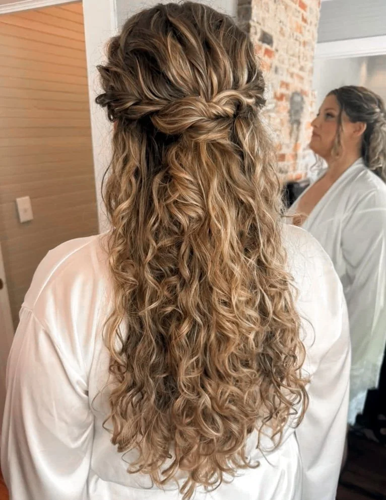 brunette half up wedding hairstyle on natural curly hair