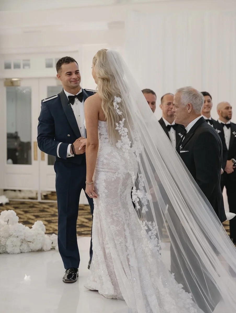 bride and groom standing at the altar