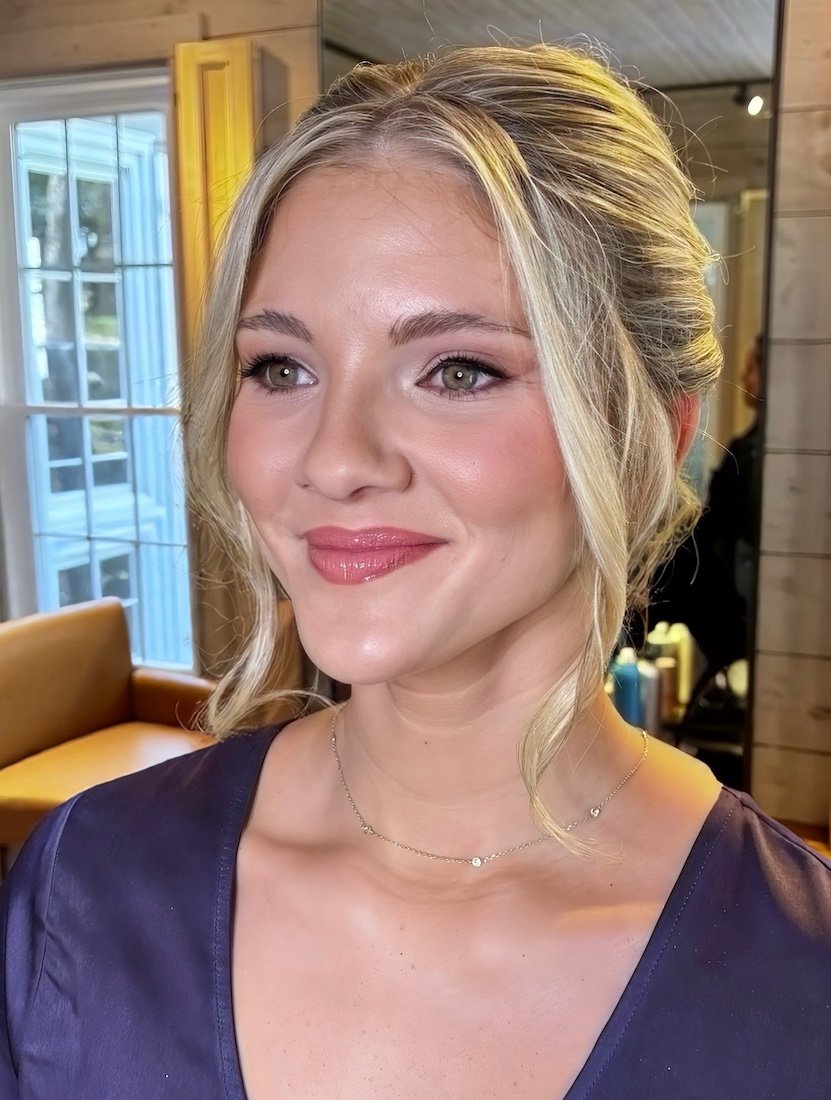 charlotte nc makeup artist creates a soft glam makeup application on blonde bride