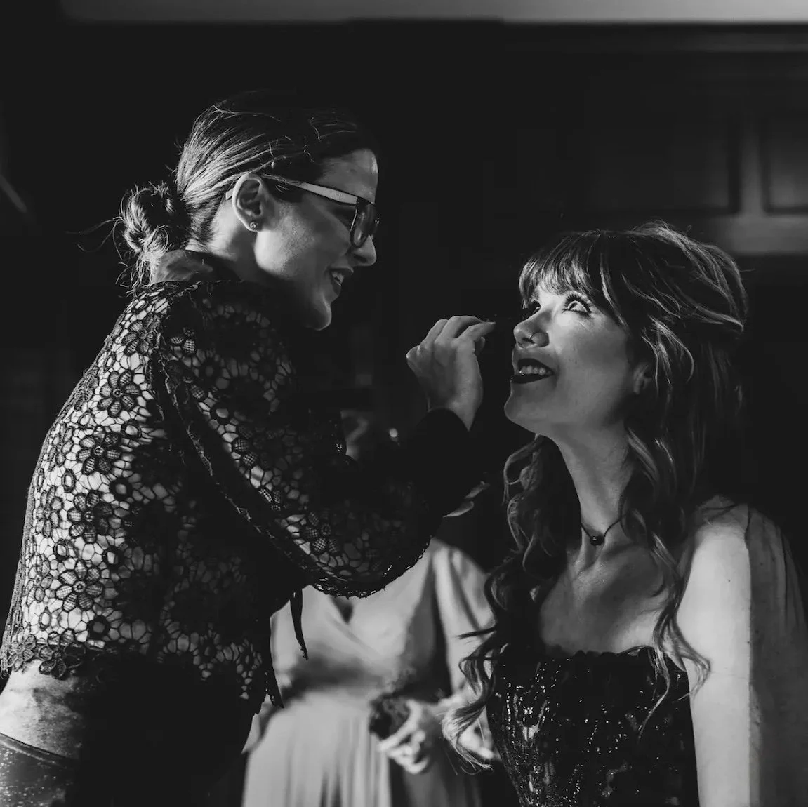 black and white photo of a makeup artist