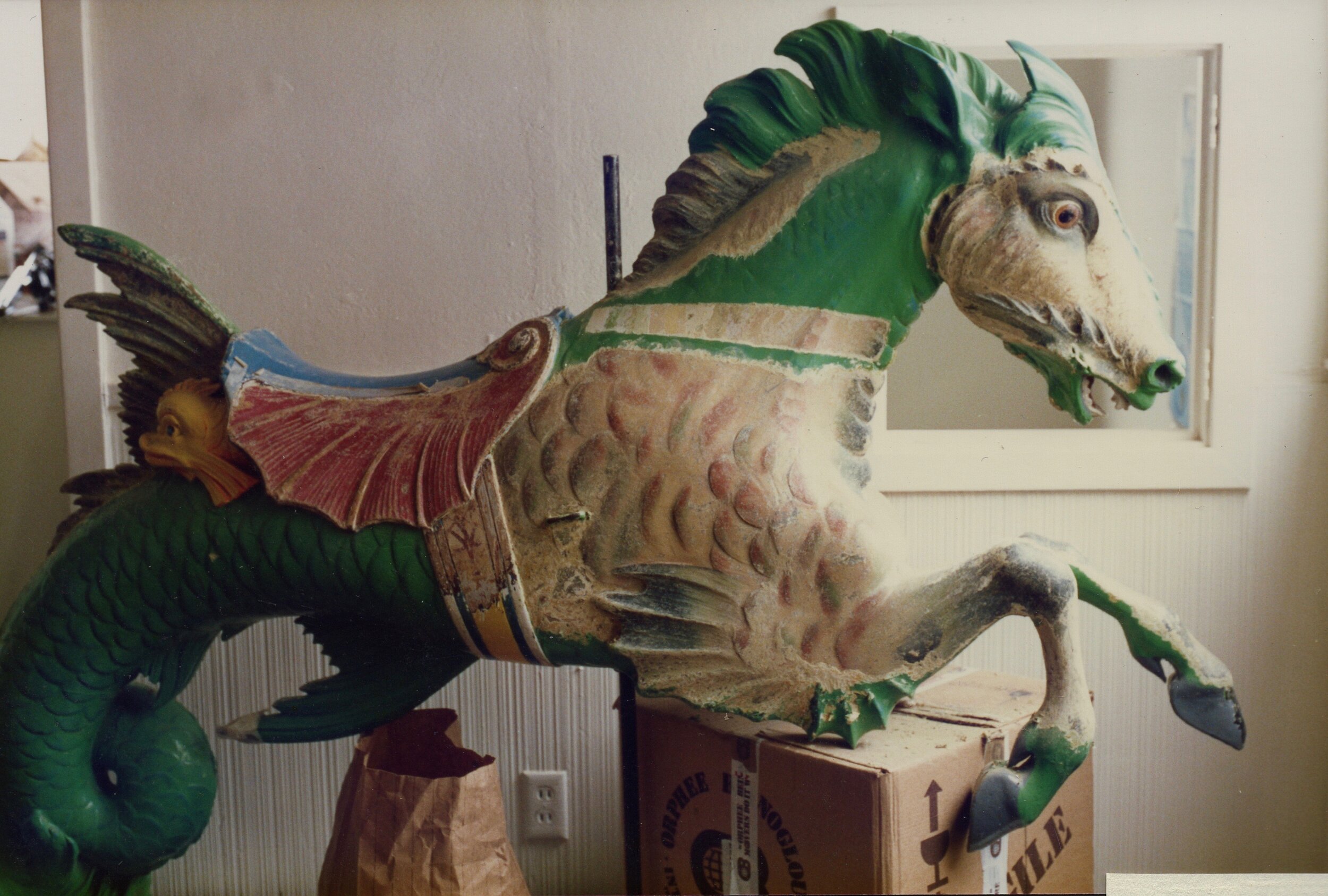 This beautiful Muller hippocampus had 13 layers of park paint covering up the sensitive original paint. You can see the layers revealed in the strip on the neck, layer by layer