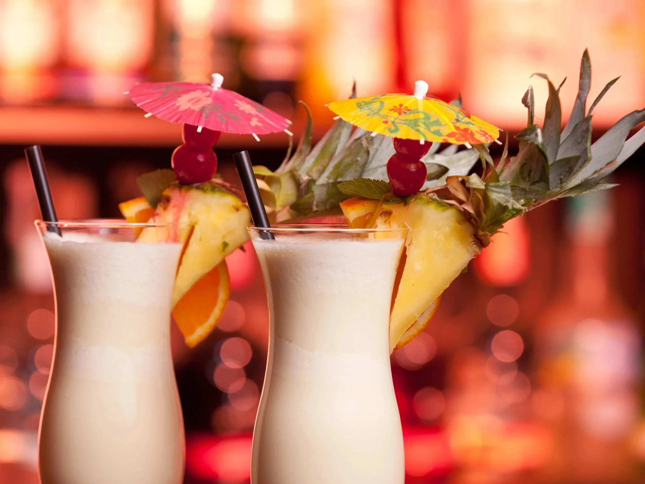 $7 Piña Coladas, one for each hand