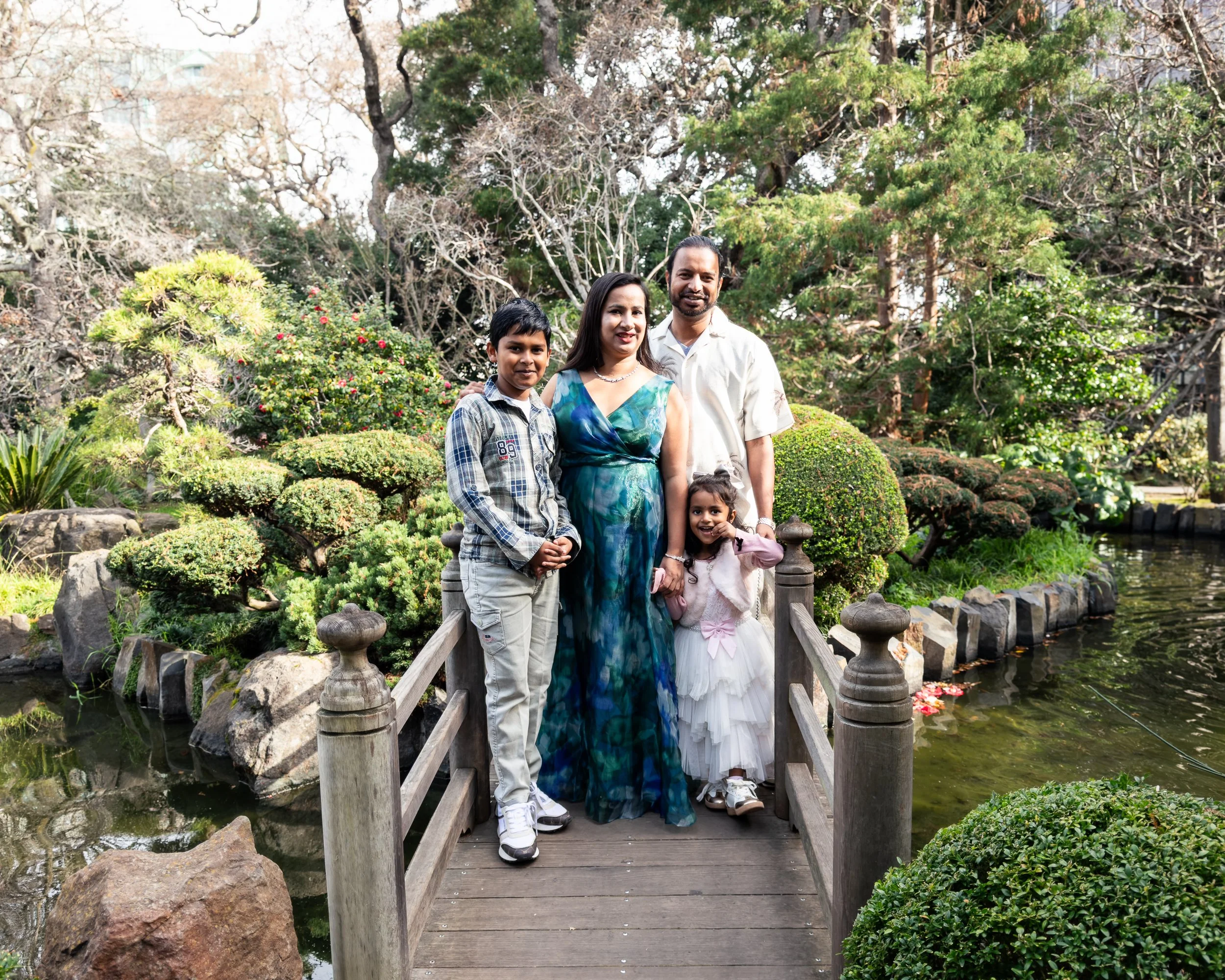 Family portrait on the garden bridge