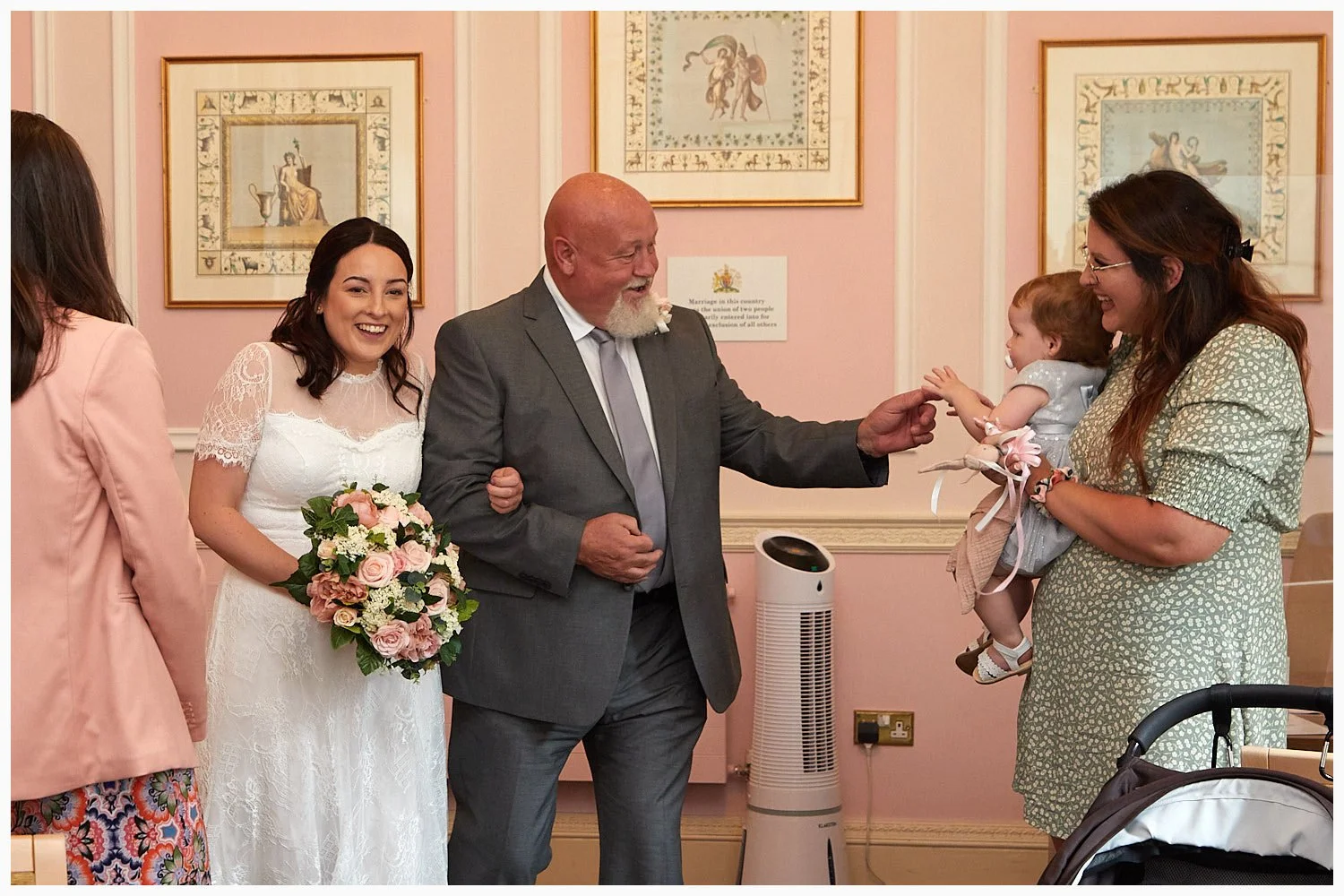 Bride enters the Carnarvon Room with her dad at the start of the wedding