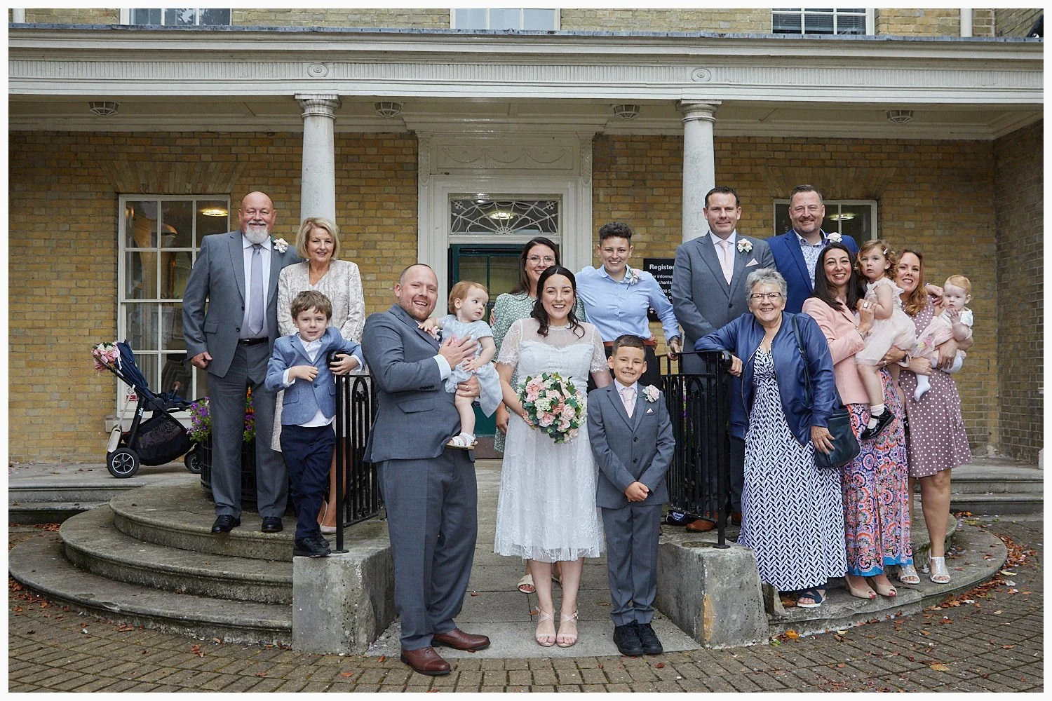 The steps outside the registry office are an ideal position to ensure that all the participants in group photos can be seen
