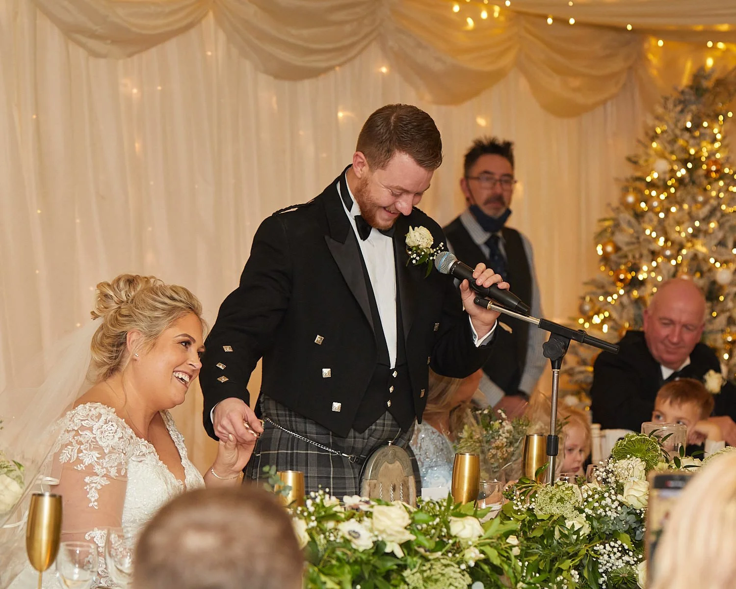 Groom makes his speech during the Christmas wedding reception at The Mill House Hotel Swallowfield