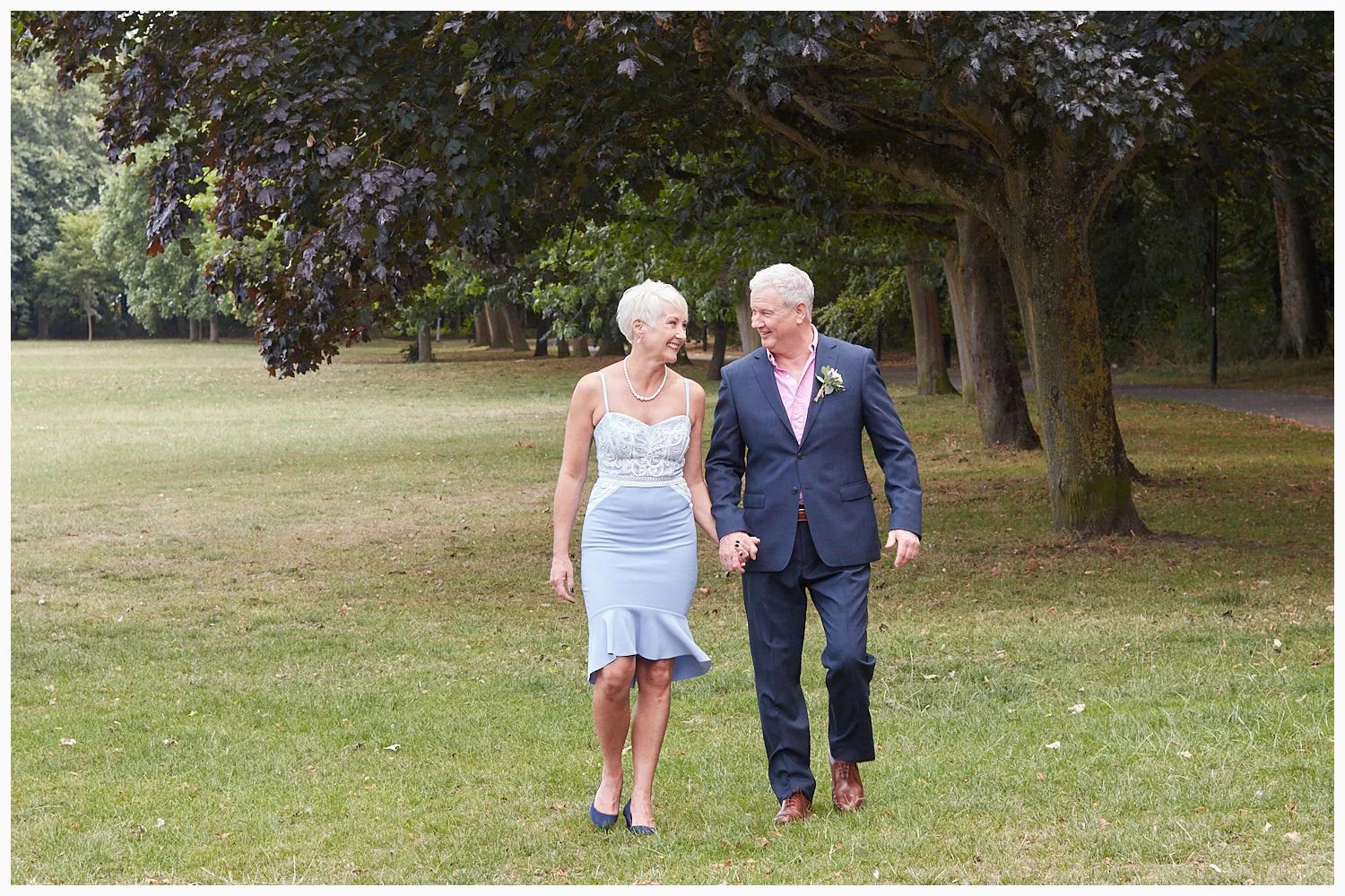 A casual stroll along the lovely park after the wedding