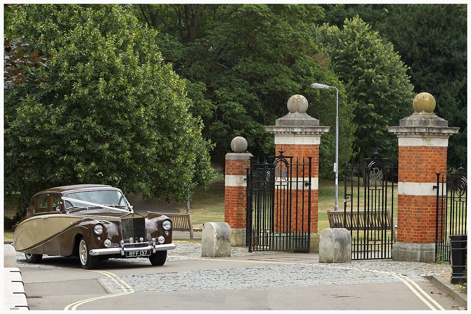 Bride arrives for her wedding at Basingstoke Registry Office in her lovely vintage limousine