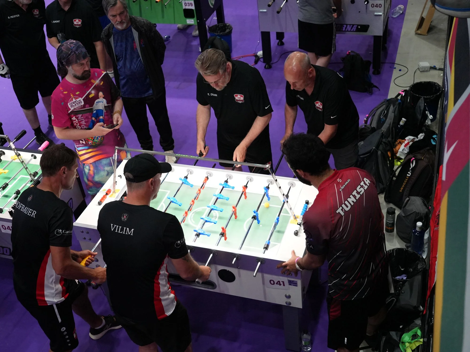 Seniors Eric Dunn (forward) and Peter Tielens (goal) play Austrians Gerald Hofbauer and Oliver Vilim in the anchor leg of the Quarter‑final.