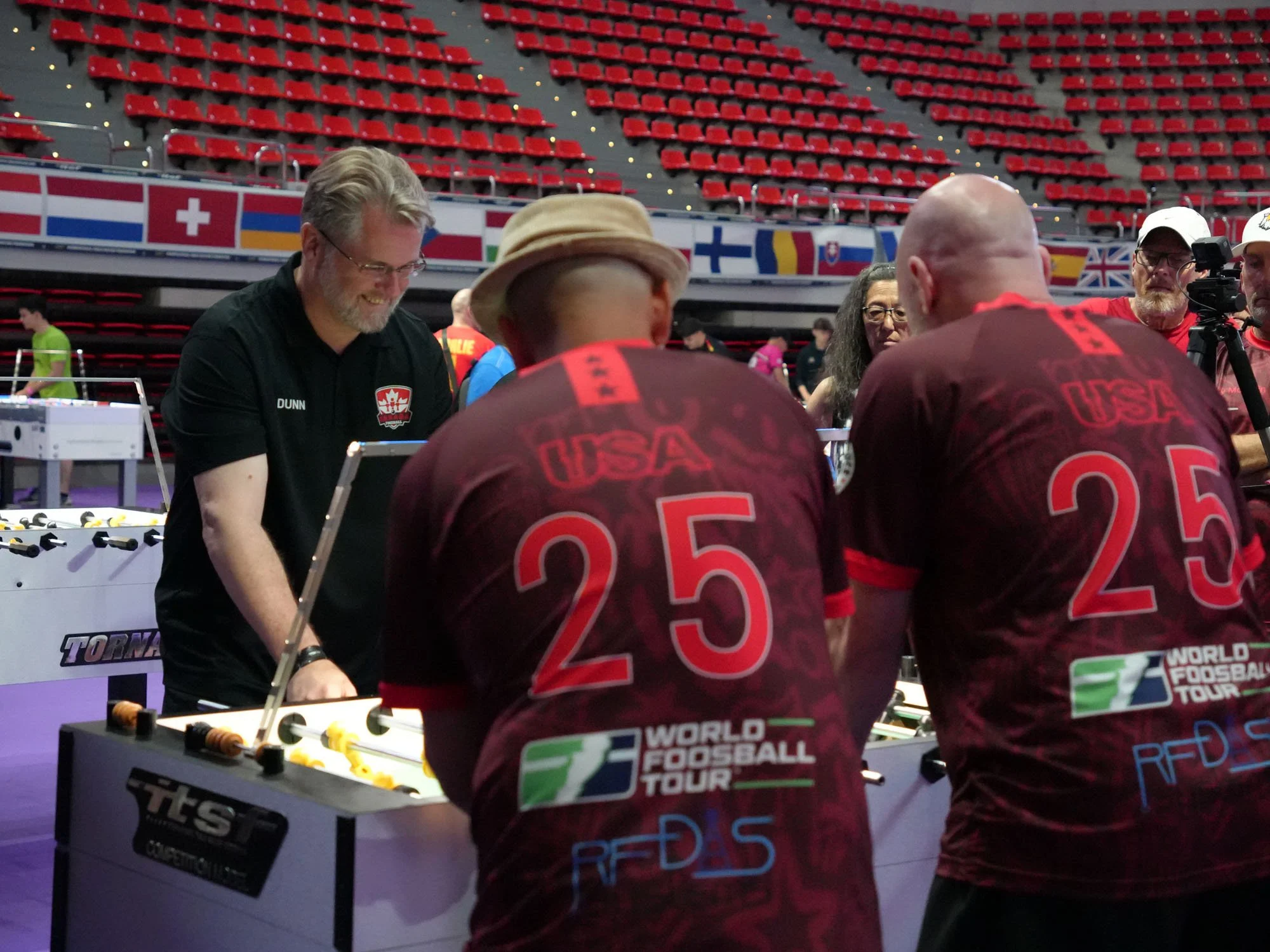 Eric Dunn (Canada) with James Castillo and Warren Vanlandingham Jr. (USA) between points.