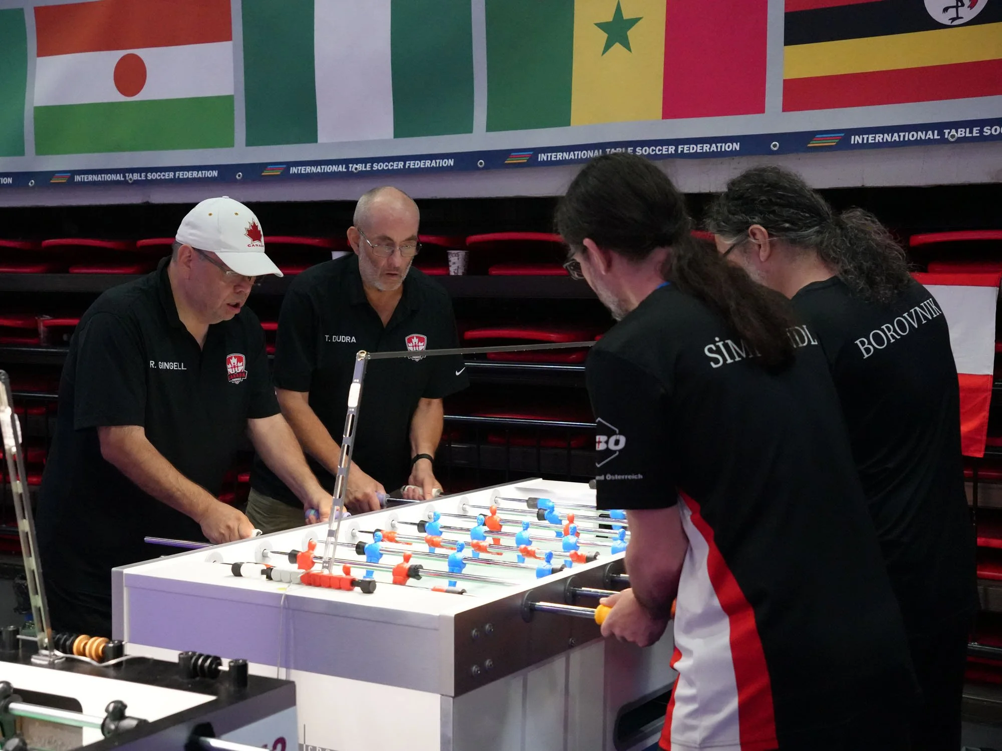 Robert Gingell (left) and Tim Dudra play Martin Borovnik and Bernhard Sillipp in Canada’s Quarter‑final win over Austria.