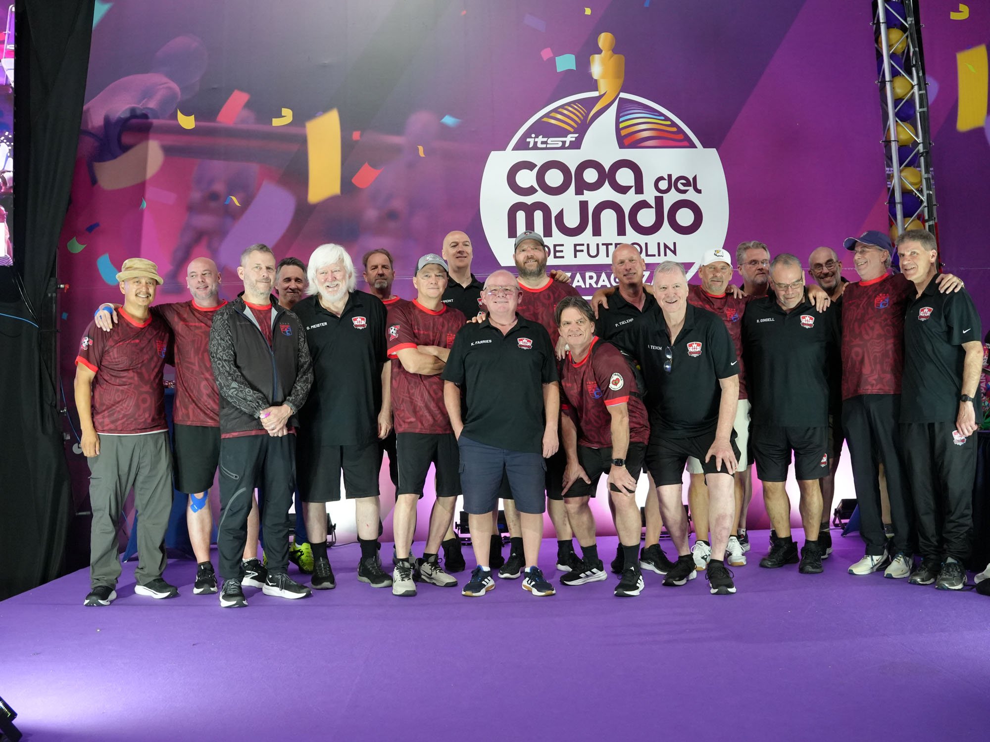 Team Canada and USA Seniors line up: from left James Castillo, Warren Vanlandingham Jr., Dave Gummeson, Todd Loffredo, Gerry Meister, Greg Mendel, Dan Barber, Steve Dumont, two unidentified USA players, Peter Tielens, Richard Tench, Tracy McMillin, E