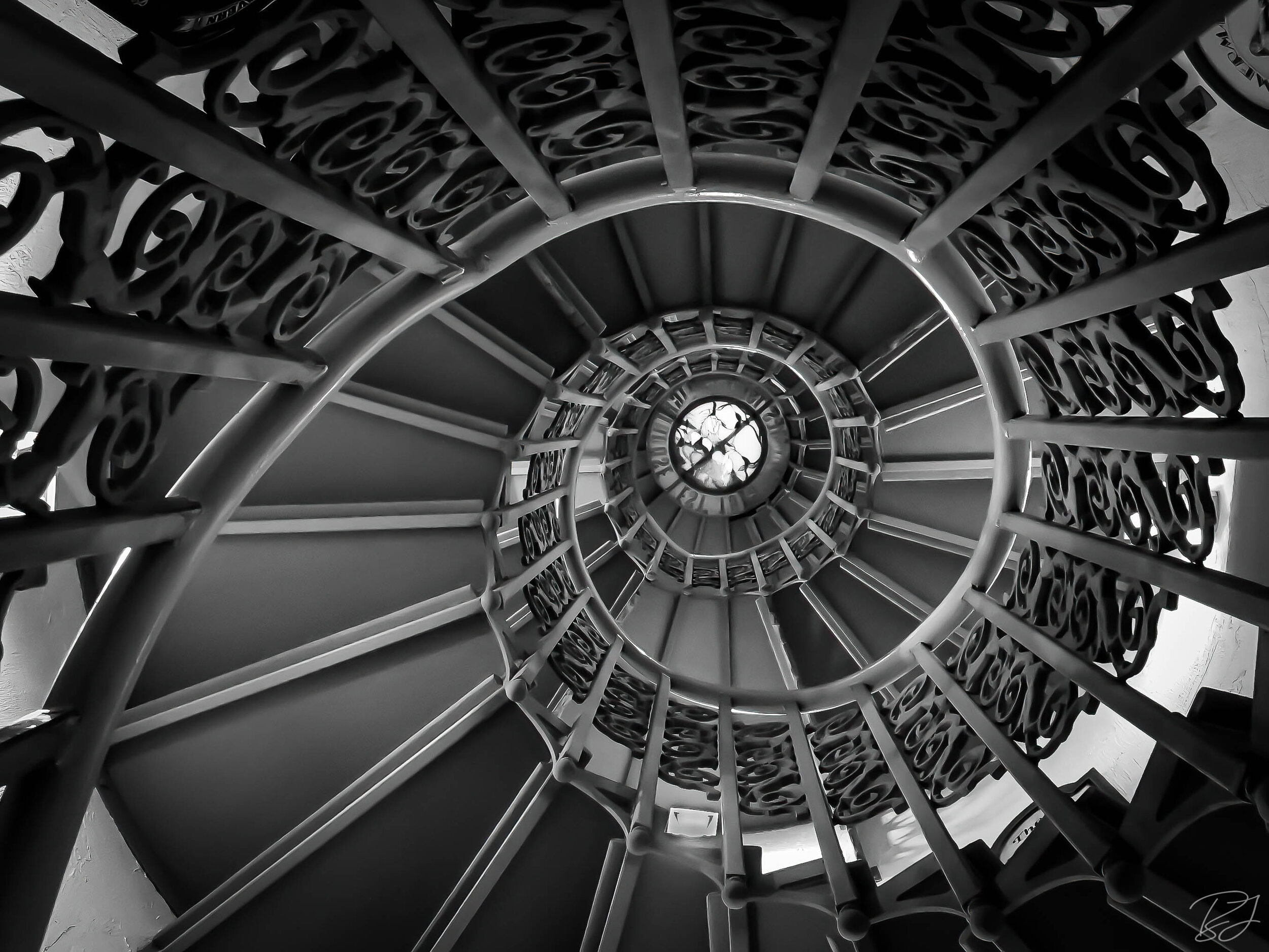 Spiral stairs in Forbes Island lighthouse, San Francisco, California.