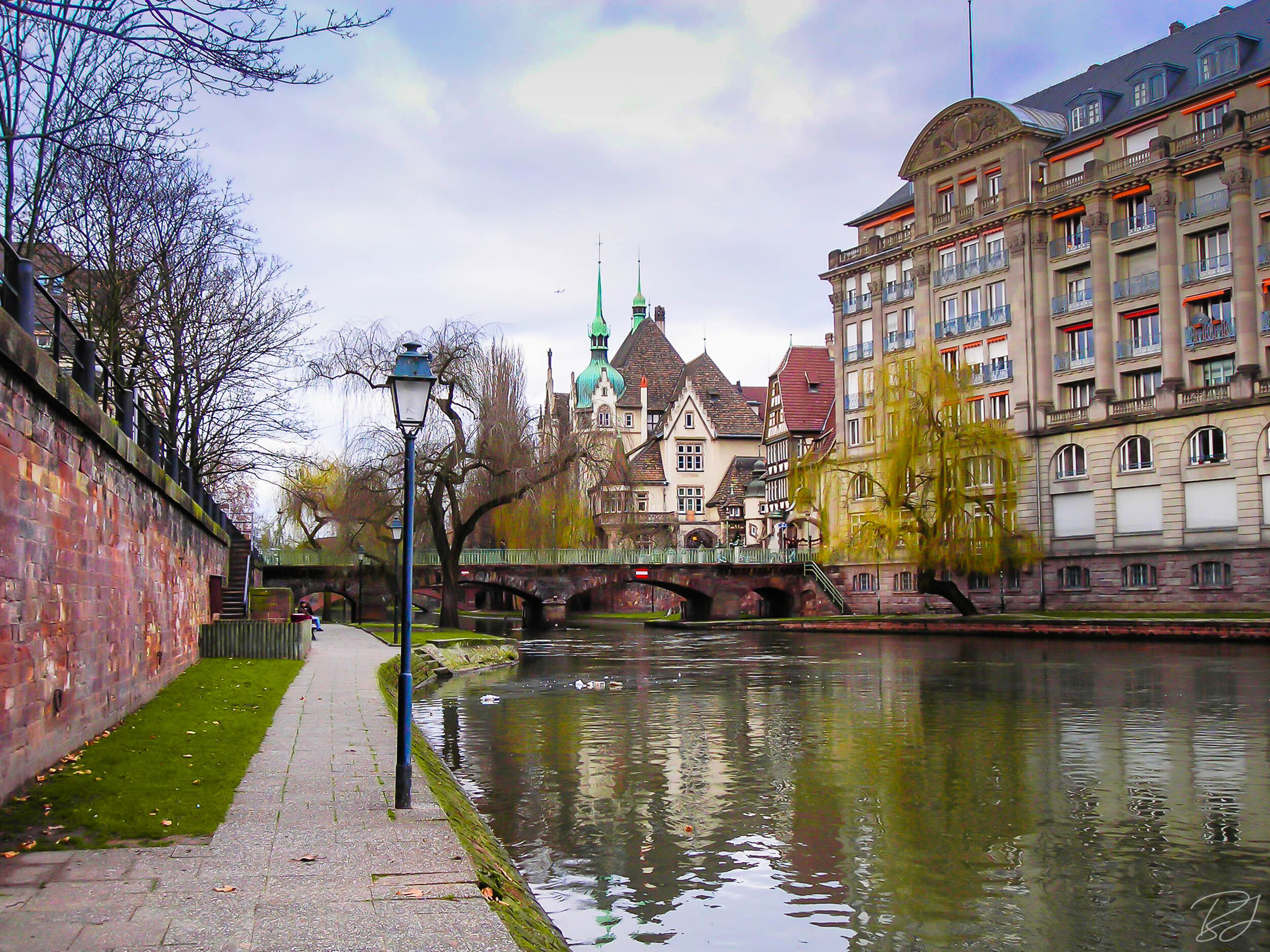 A serene scene along a canal, Strasbourg, France.