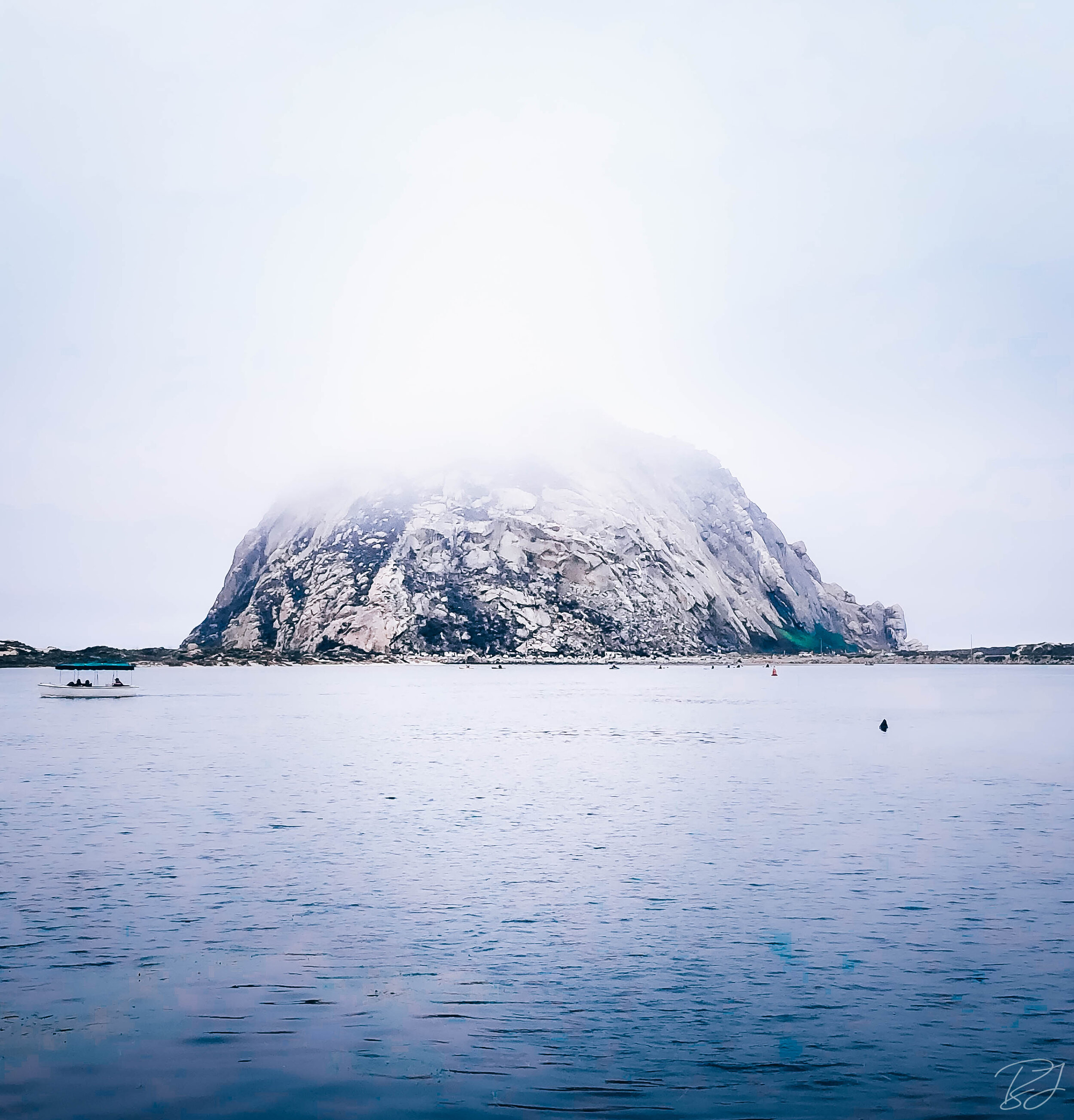 The Morro Rock, a volcanic plug at the entrance to Morro Bay Harbor, Morro Bay, California.