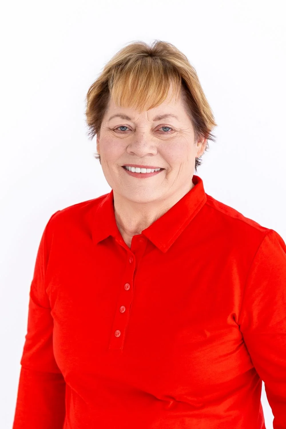 Arden Moore in a red long sleeve polo shirt