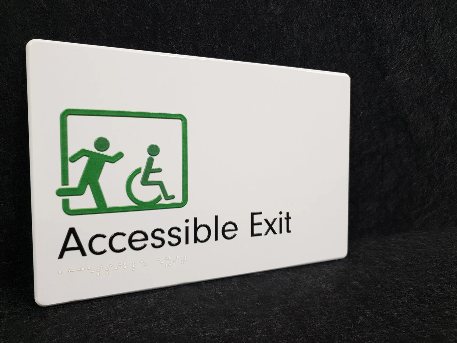 31-braille-accessible-exit-angled-sign-tint-design.jpg