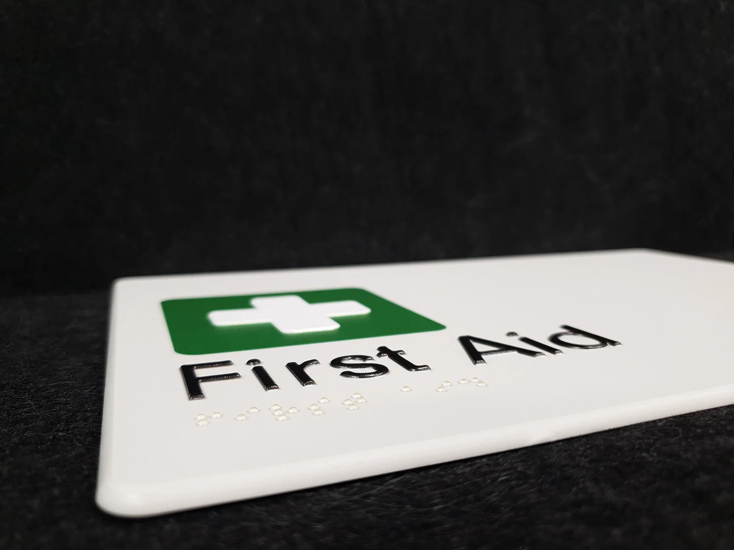 41-braille-first-aid-sign-closeup-tint-design.jpg