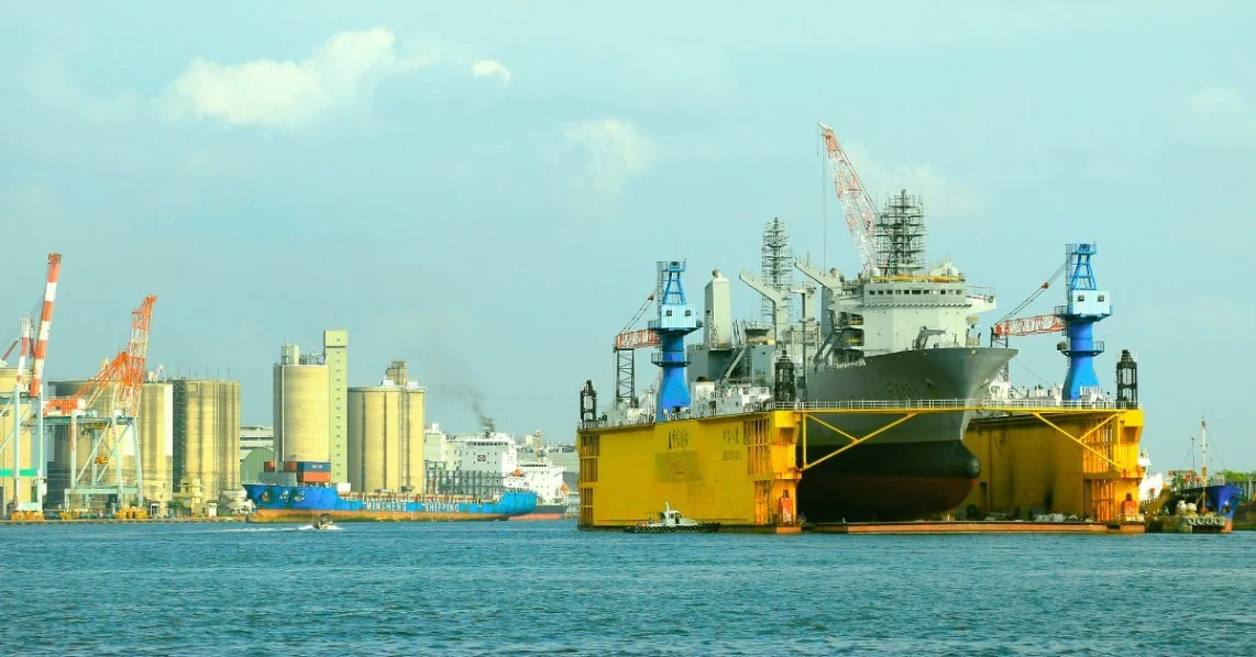 Vessels in the harbour in Kaohsiung City, Taiwan. Credit: Photo by Johnson Hung on Unsplash